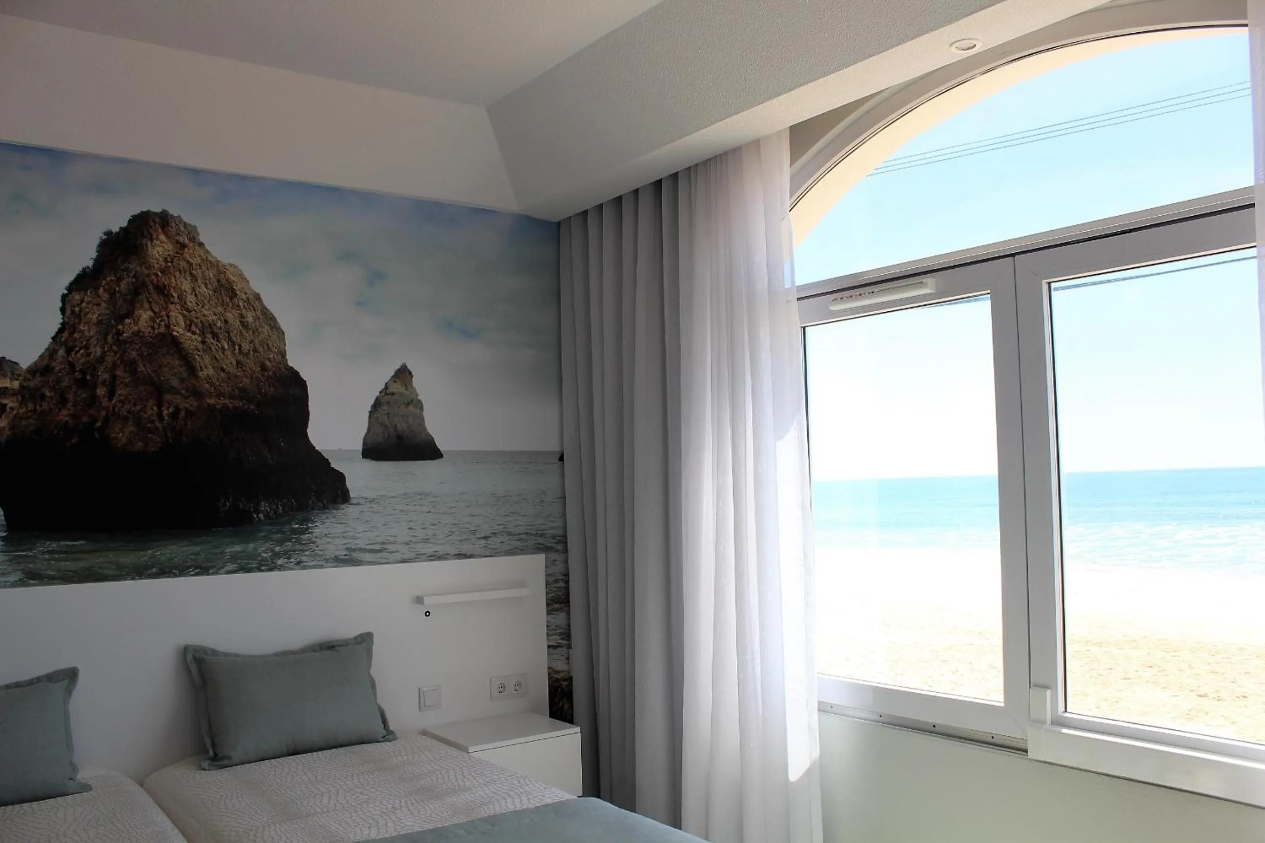 Bedroom in Golden Beach Guest House & Rooftop Bar