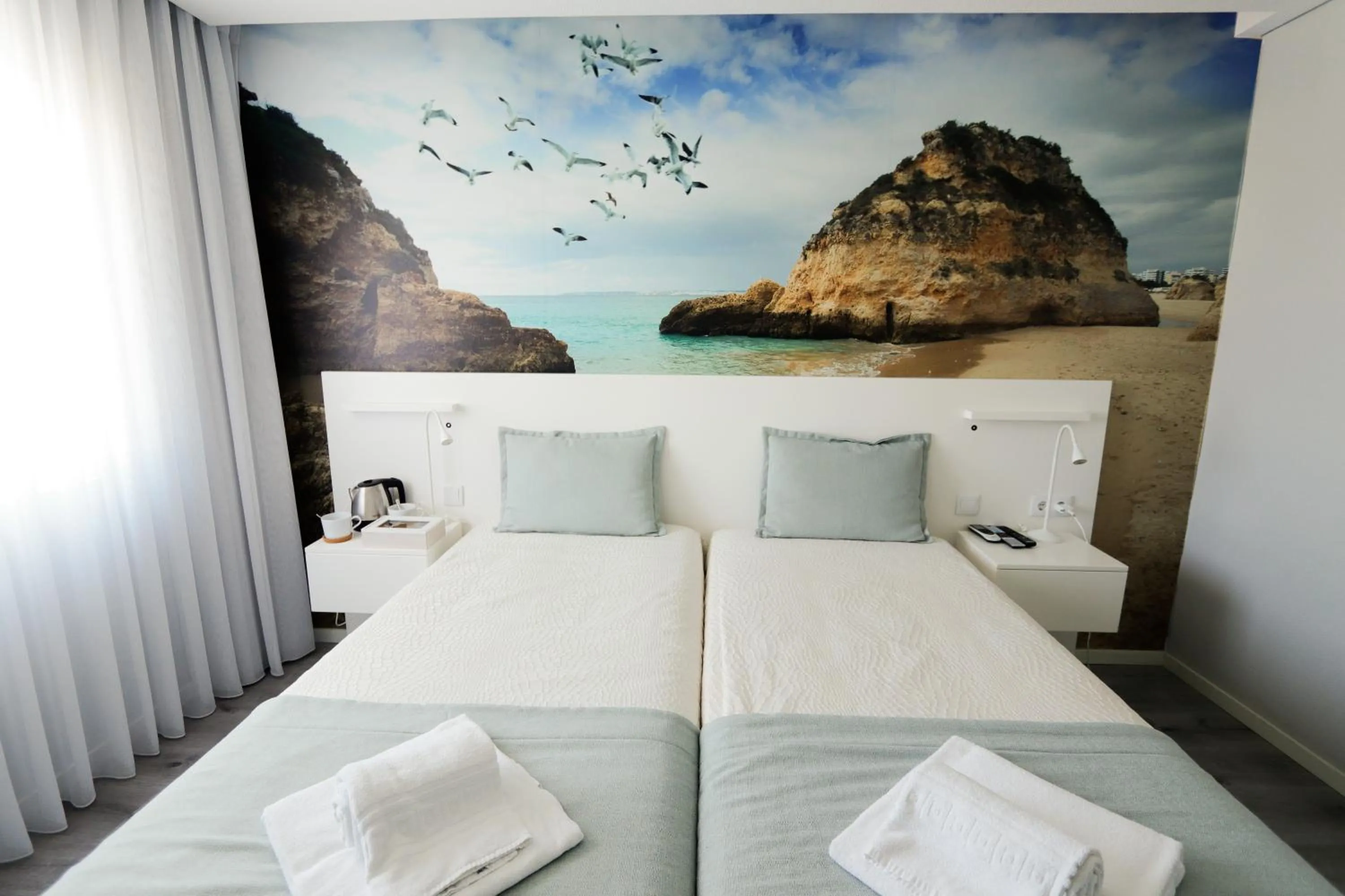 Bed in Golden Beach Guest House & Rooftop Bar