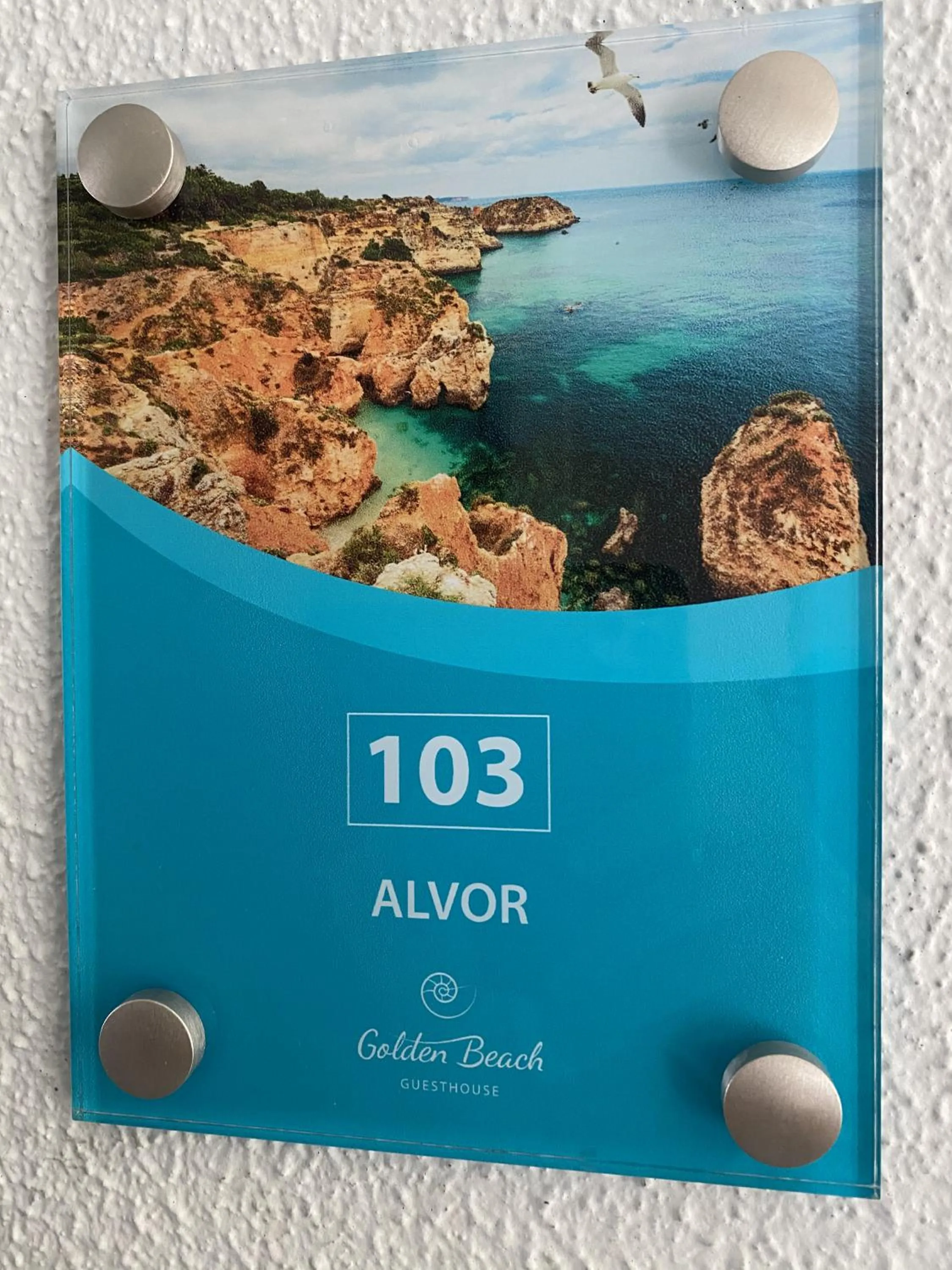 Property logo or sign in Golden Beach Guest House & Rooftop Bar