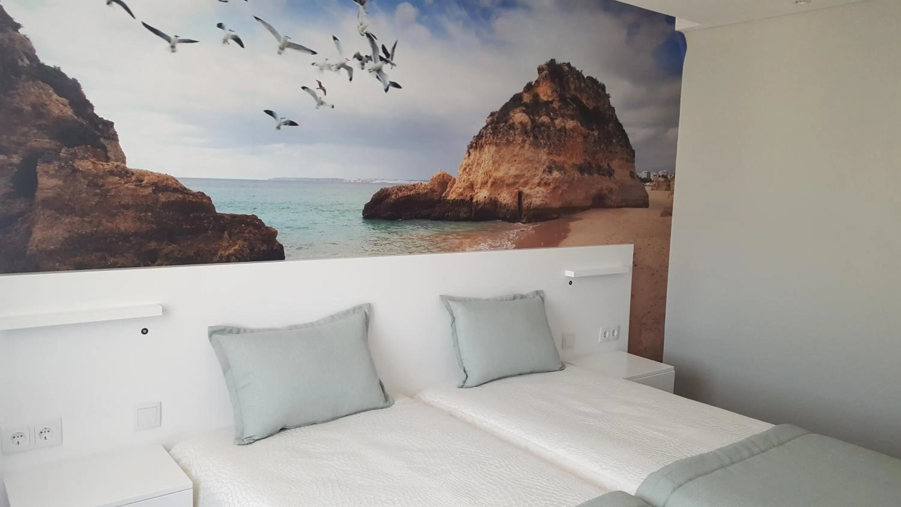 Bedroom, Bed in Golden Beach Guest House & Rooftop Bar