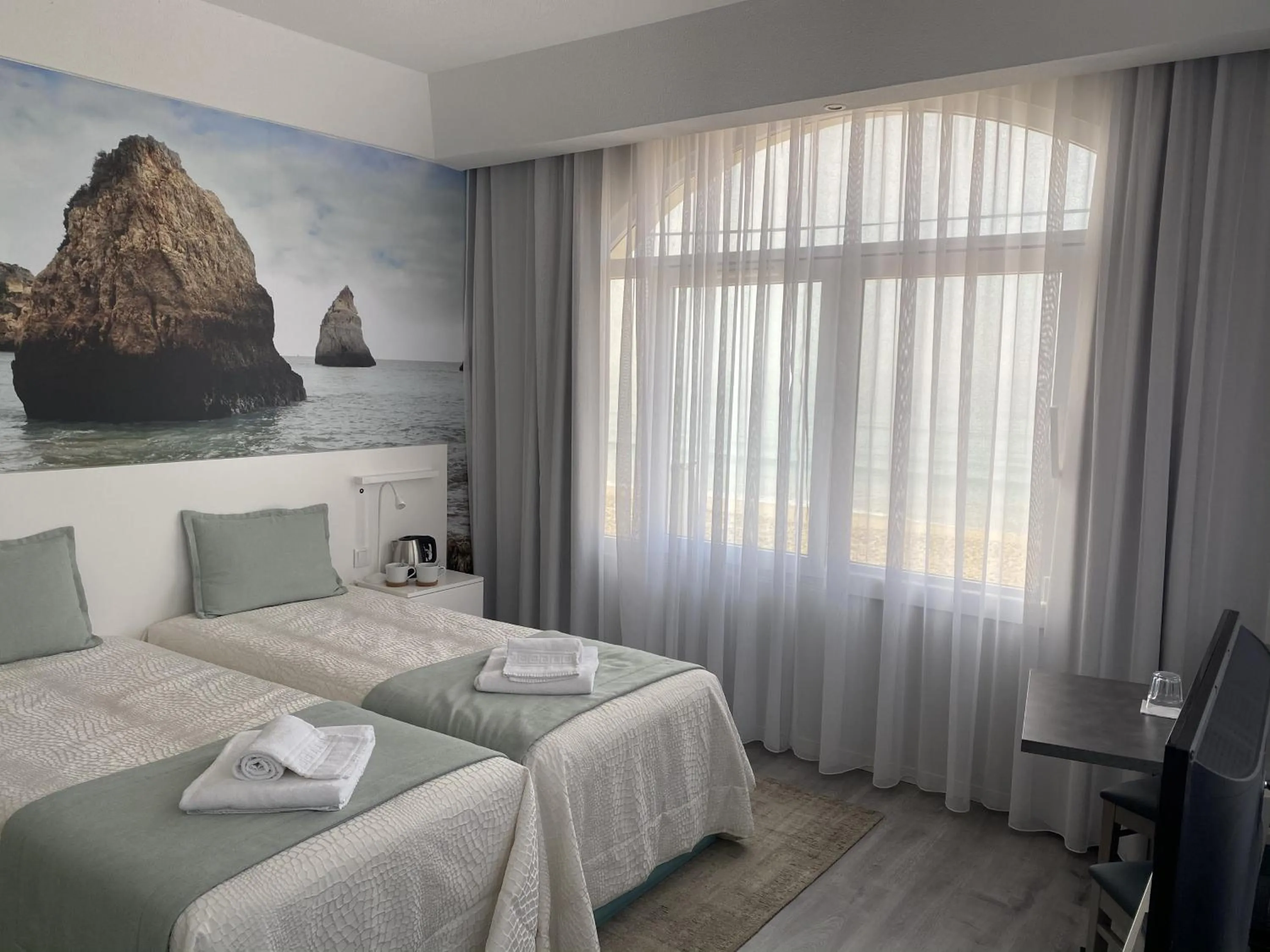 Bed in Golden Beach Guest House & Rooftop Bar