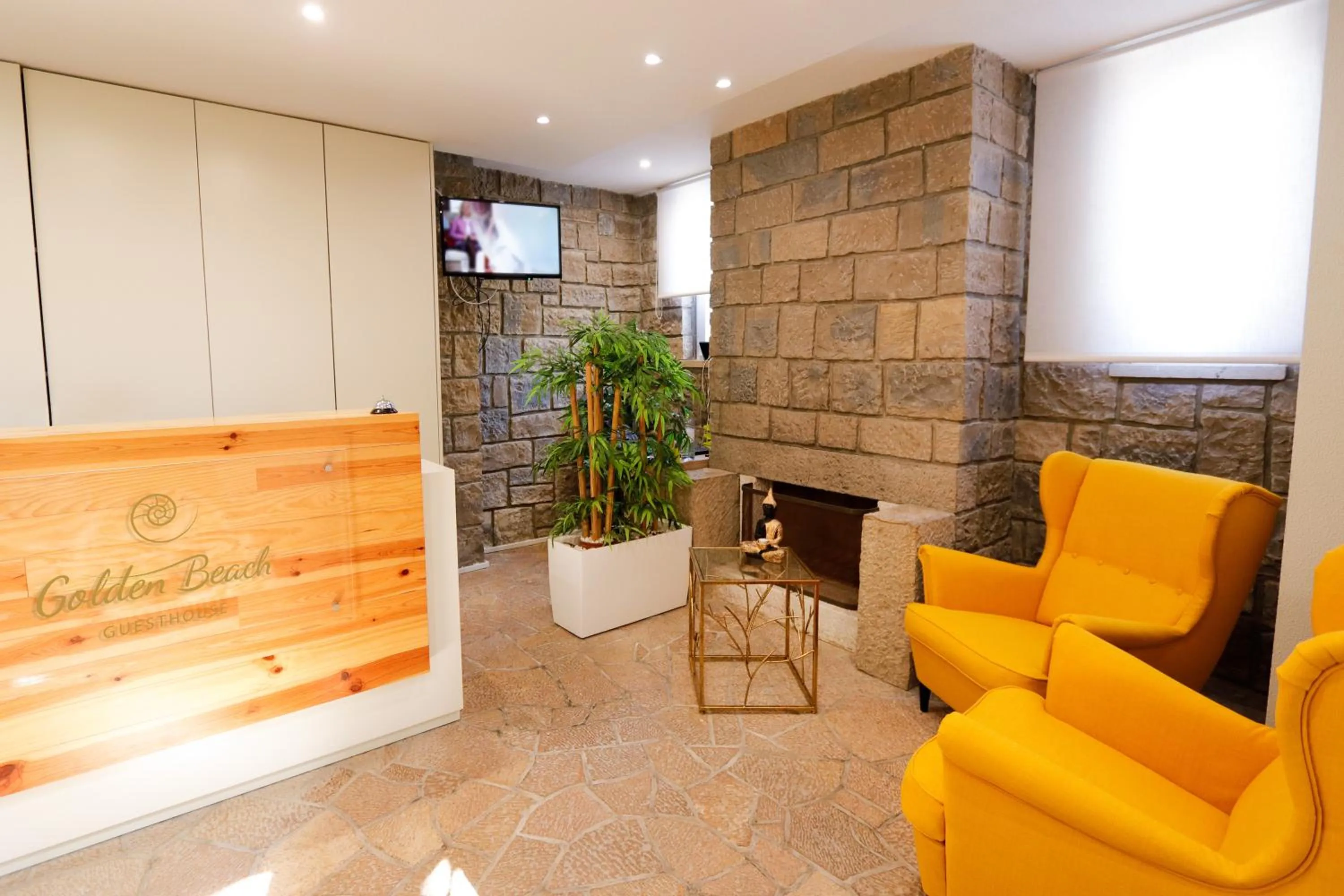 Lobby or reception in Golden Beach Guest House & Rooftop Bar