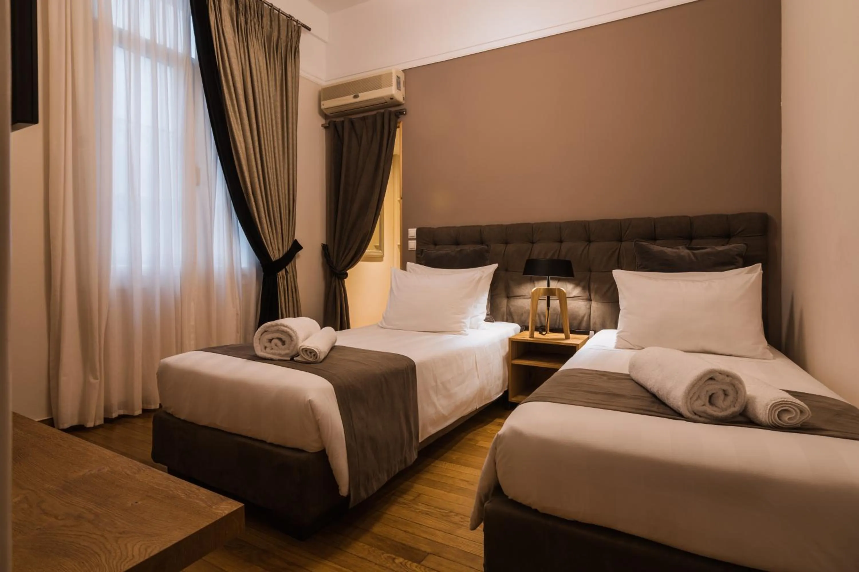 Bed in Acropolis Exclusive Residences