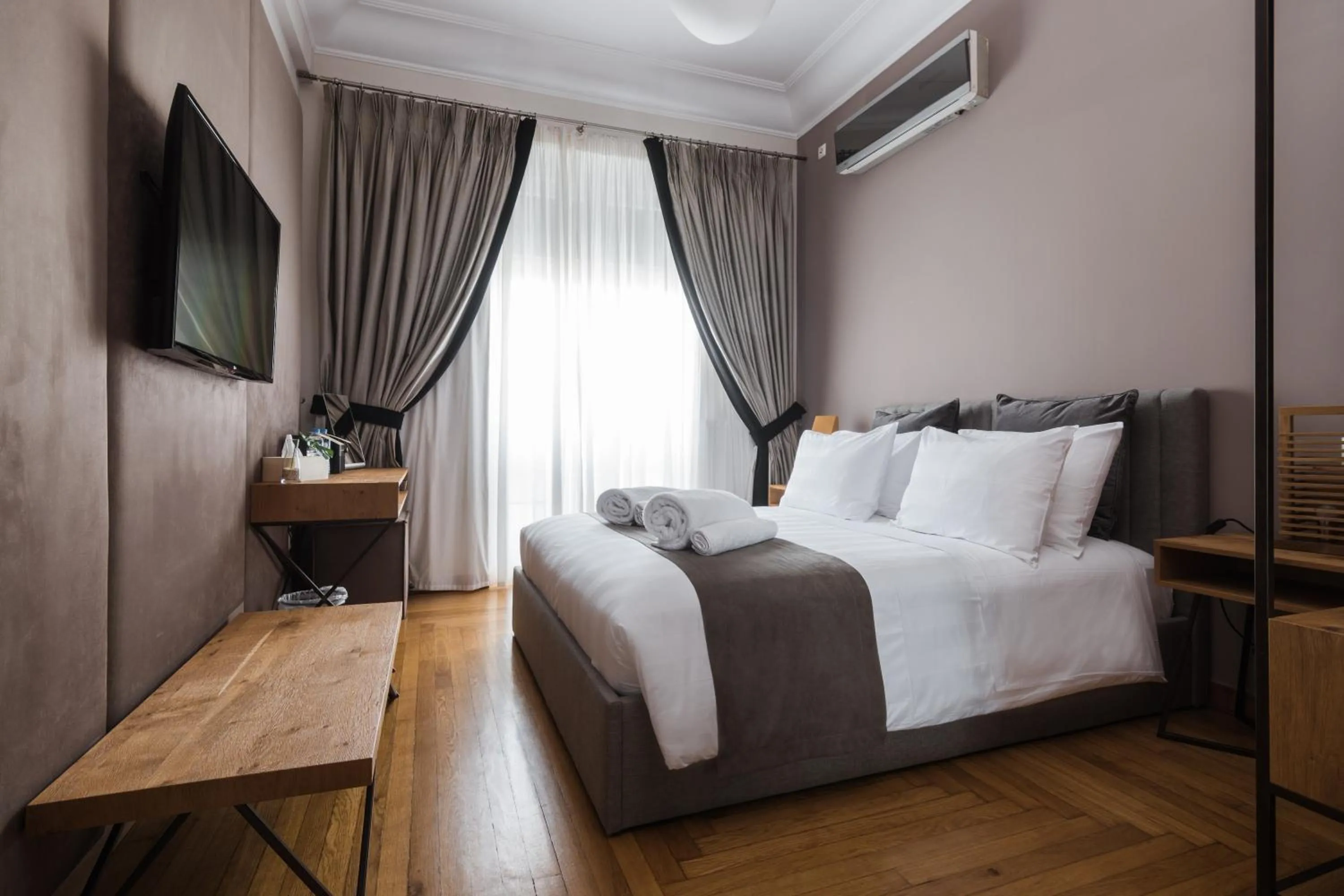 Bed in Acropolis Exclusive Residences