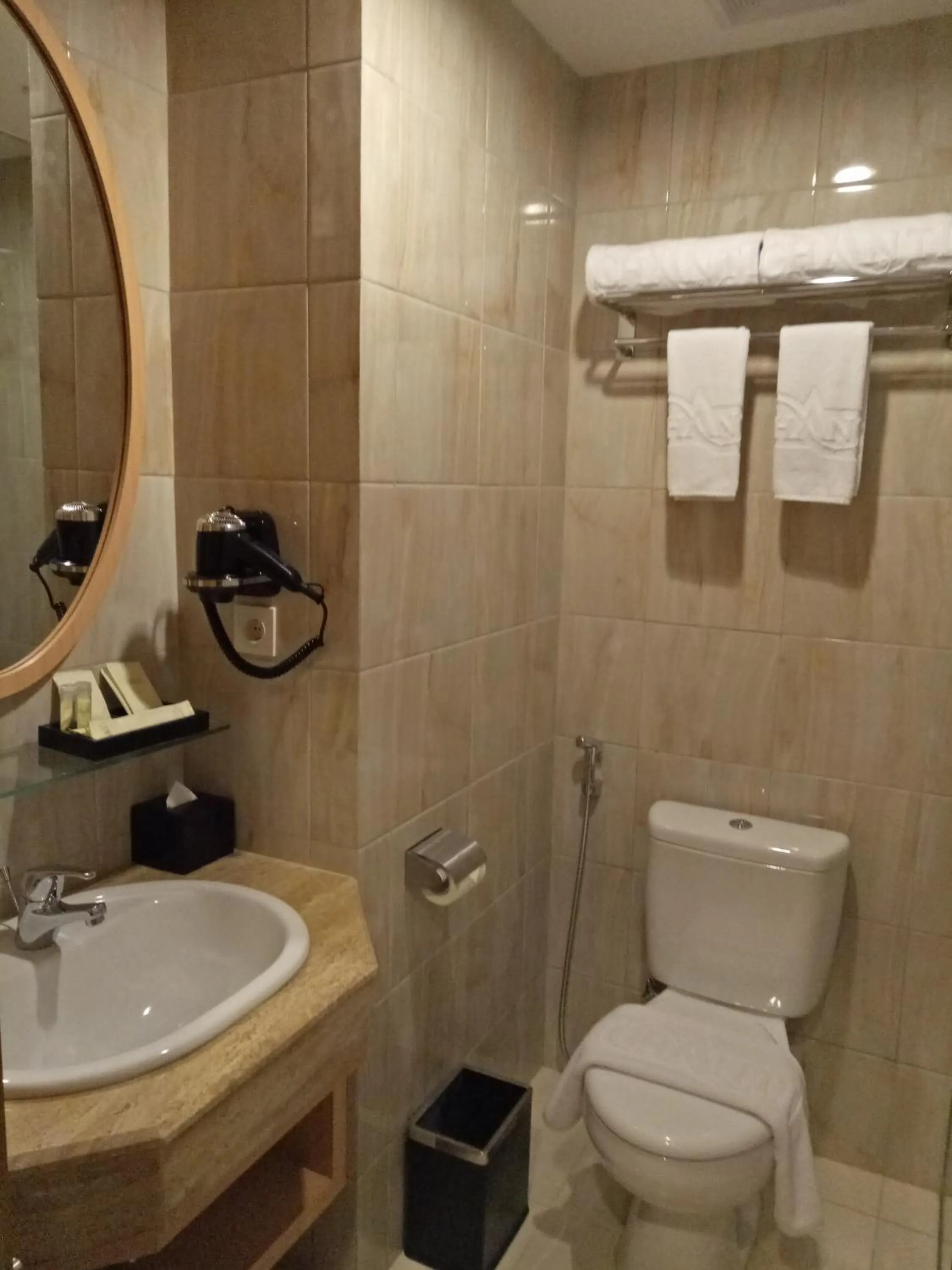 Bathroom in Hotel Chanti Managed by TENTREM Hotel Management Indonesia