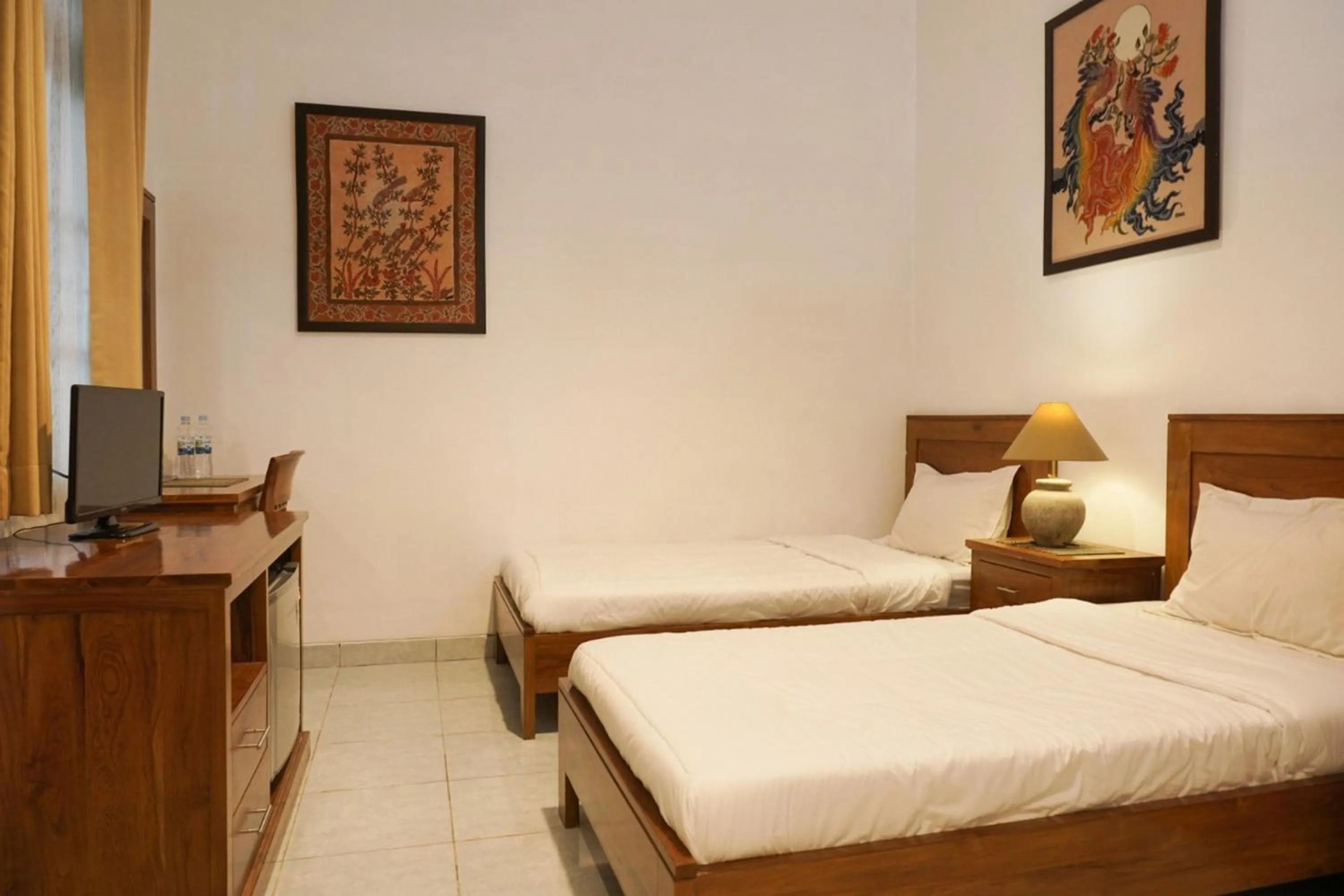 Bed in RedDoorz at Griya Cemara Homestay Yogyakarta