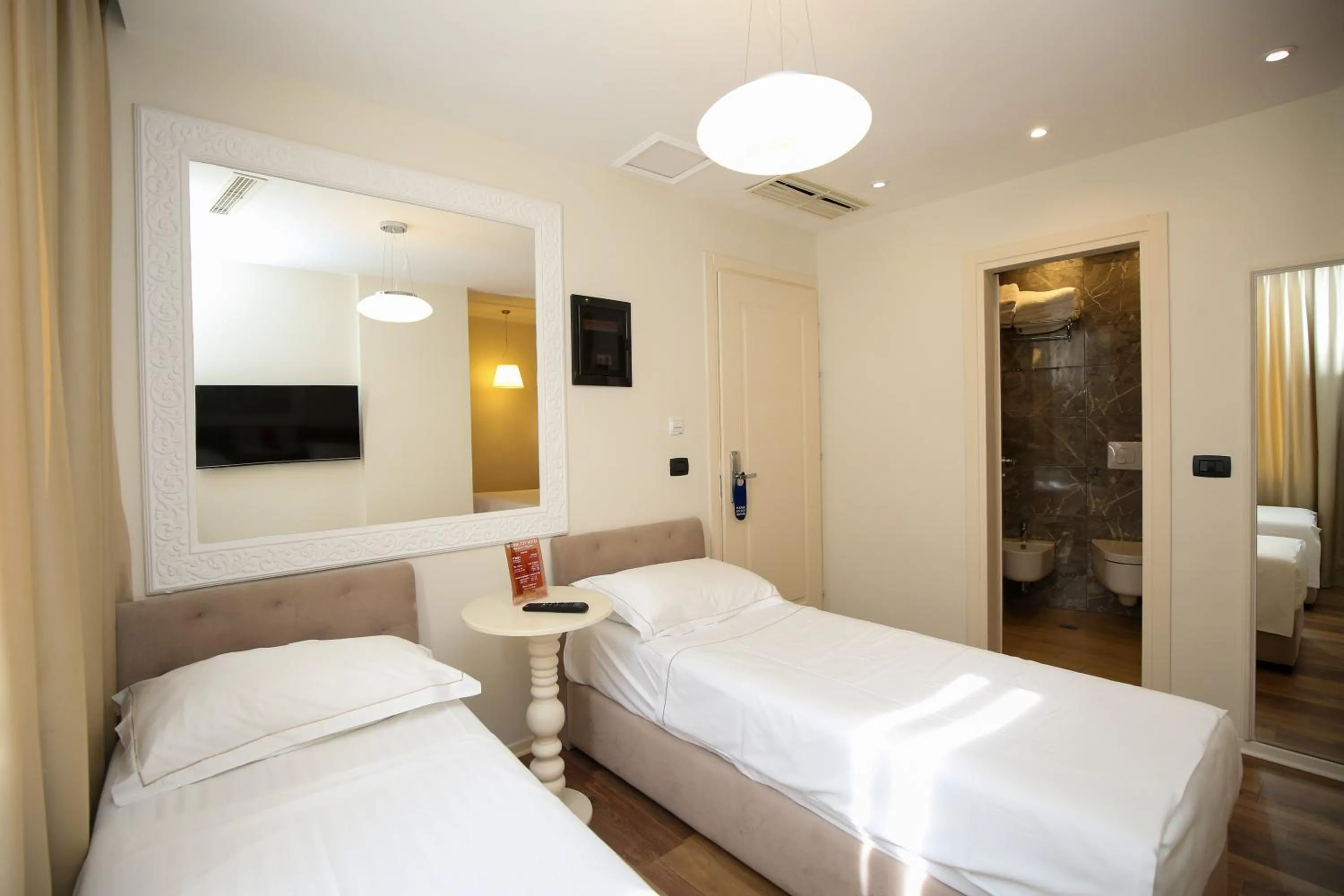 View (from property/room), Bed in Regina City Hotel & SPA