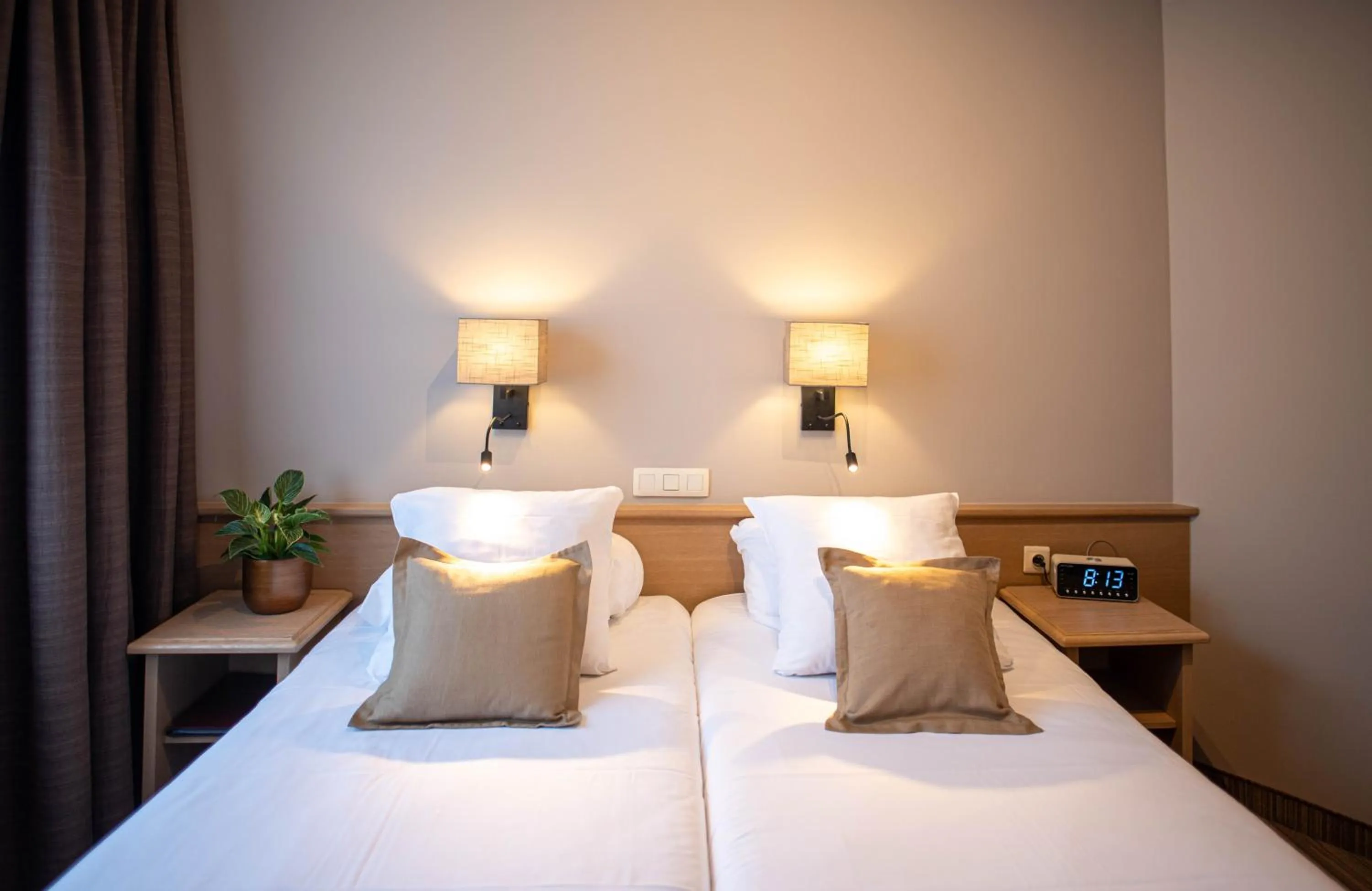 Bed in Ambassador Hotel