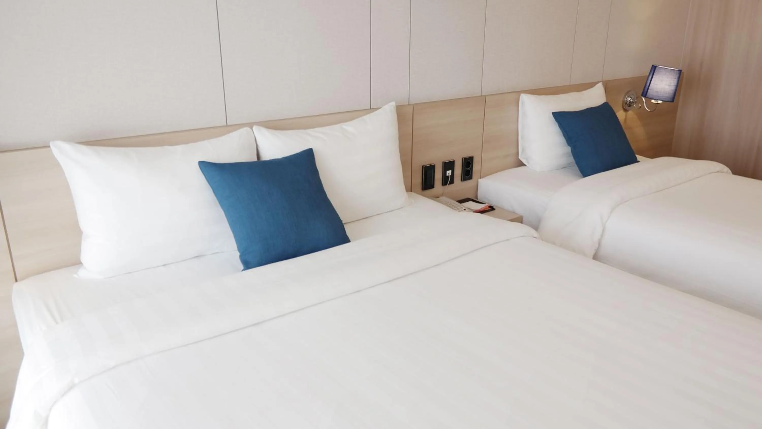 Bed in Hotel bridge Seogwipo