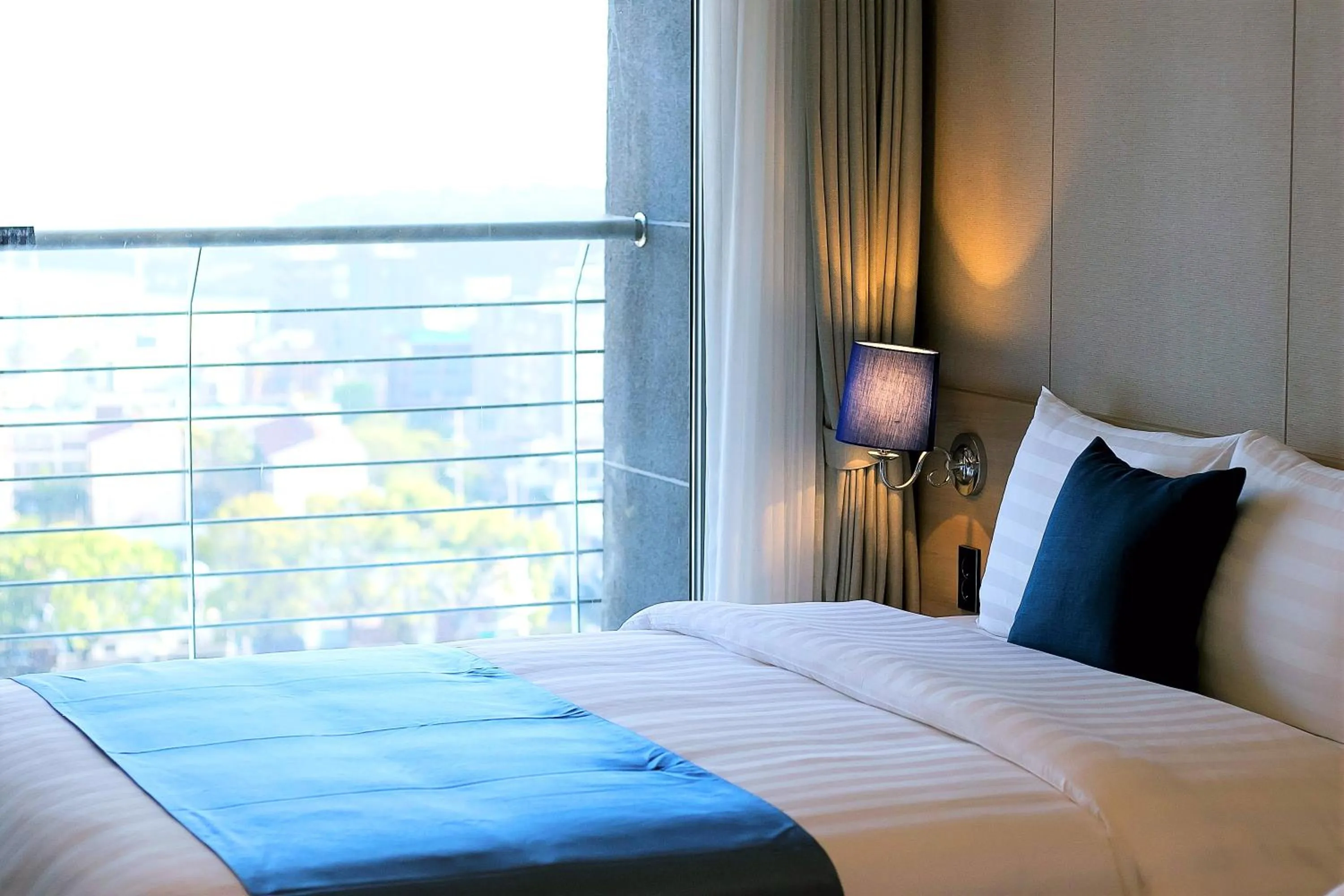 Bed in Hotel bridge Seogwipo