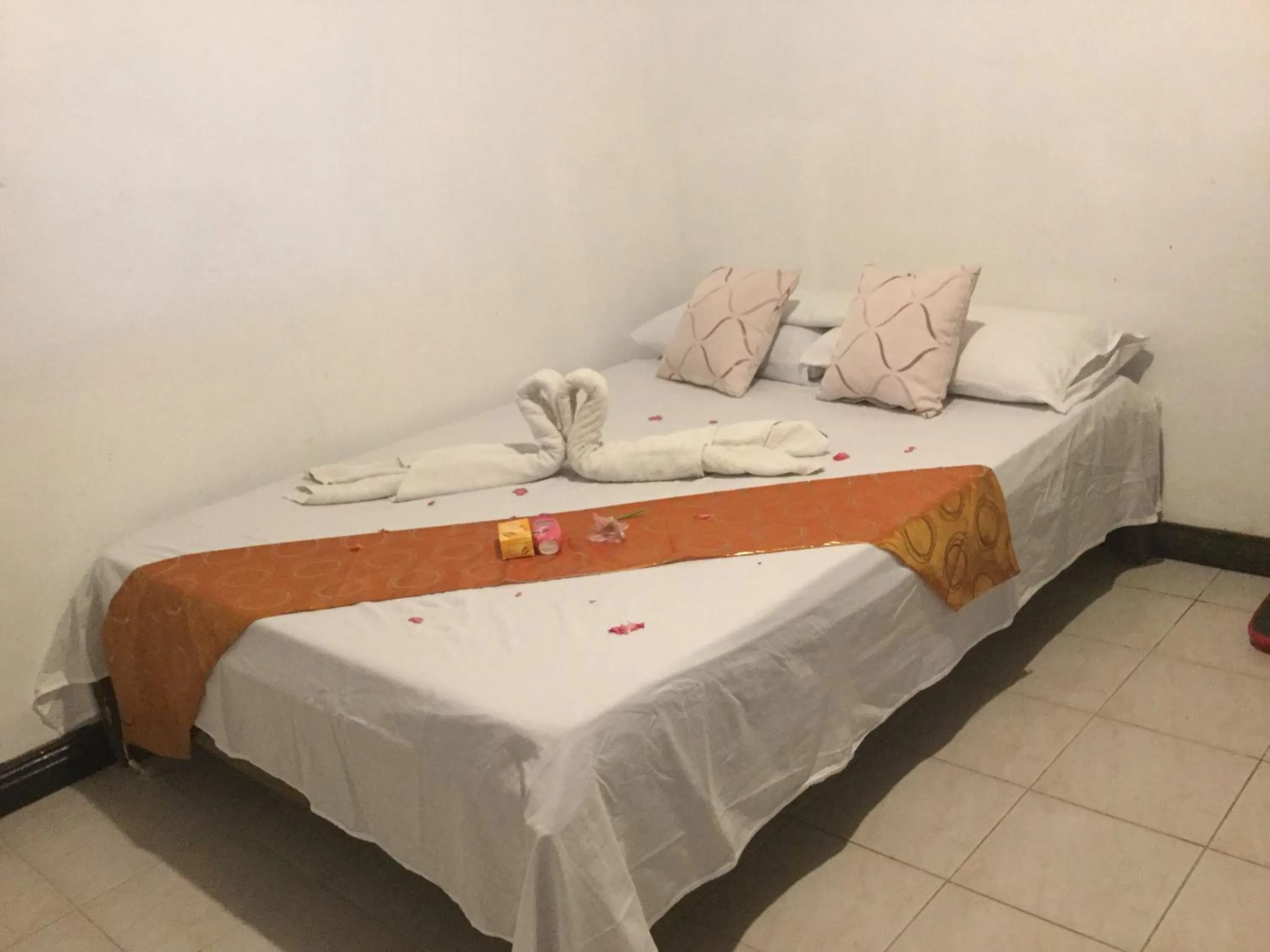 Bed in Turtle Cove Exclusive Island Resort