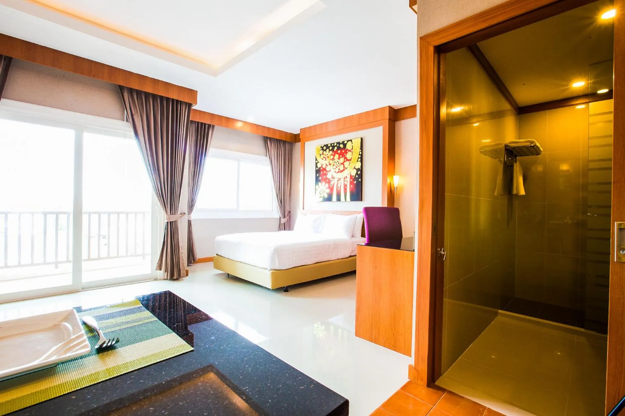 Bed in Romantic Khon Kaen Hotel