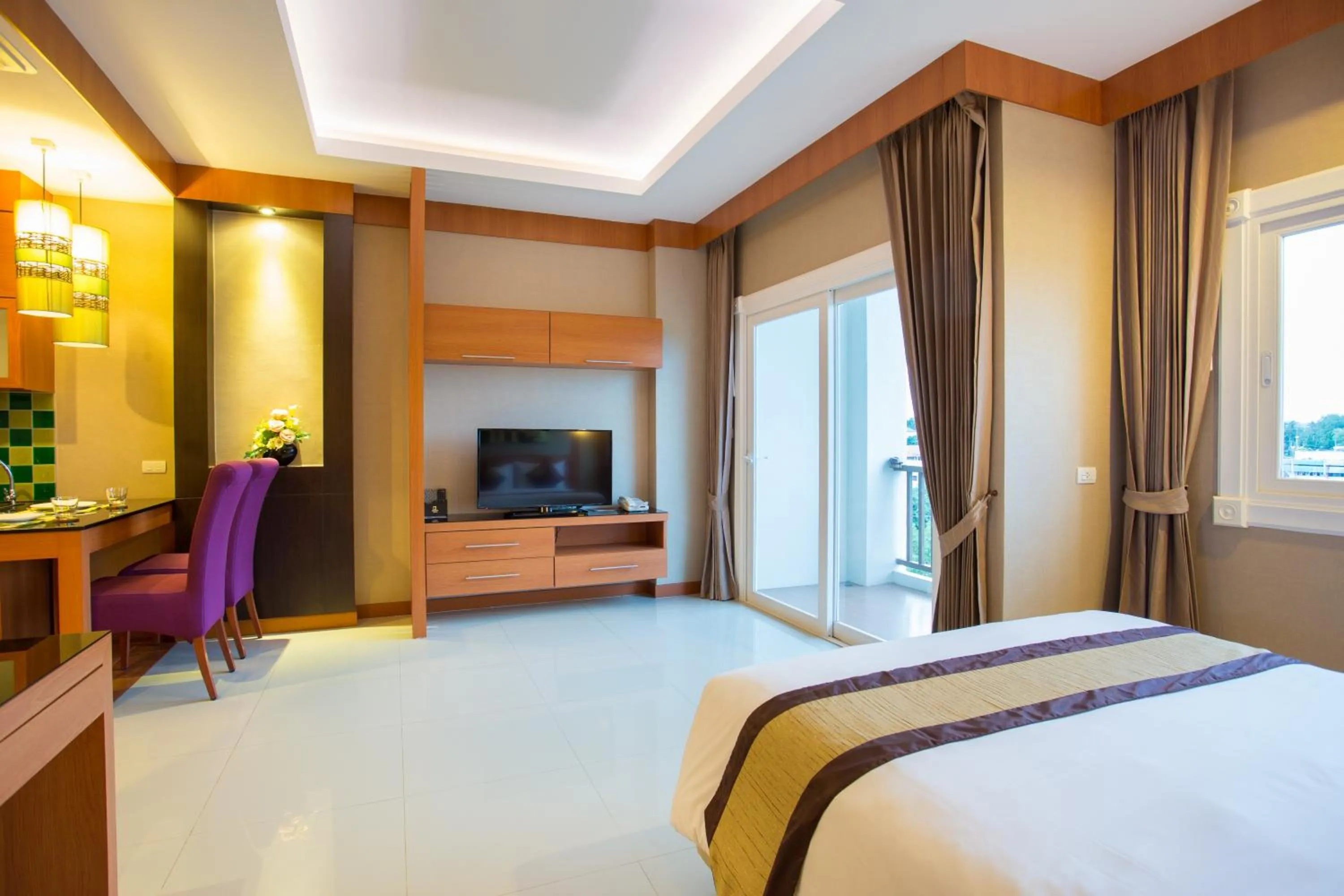 Bed in Romantic Khon Kaen Hotel