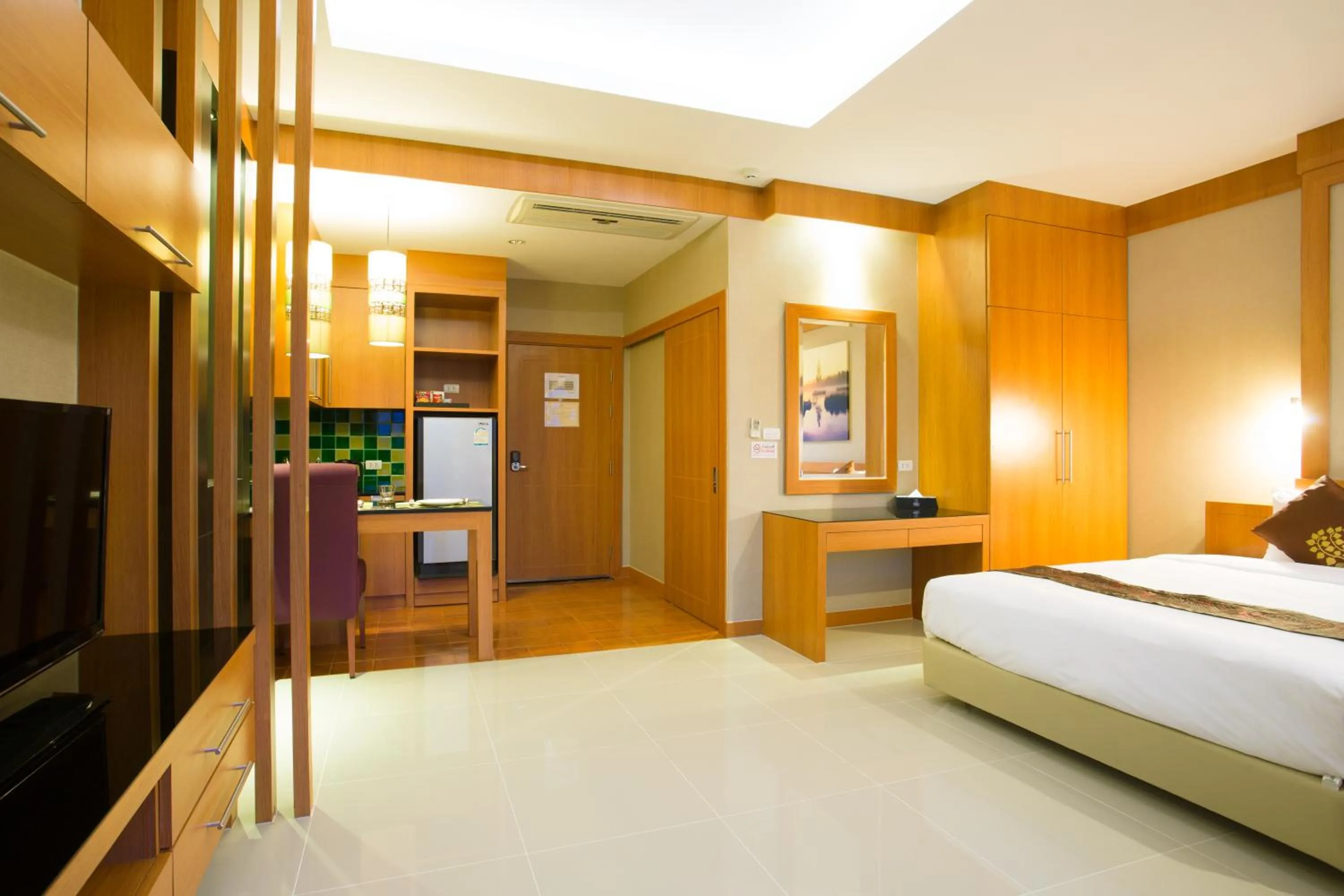 Bed in Romantic Khon Kaen Hotel