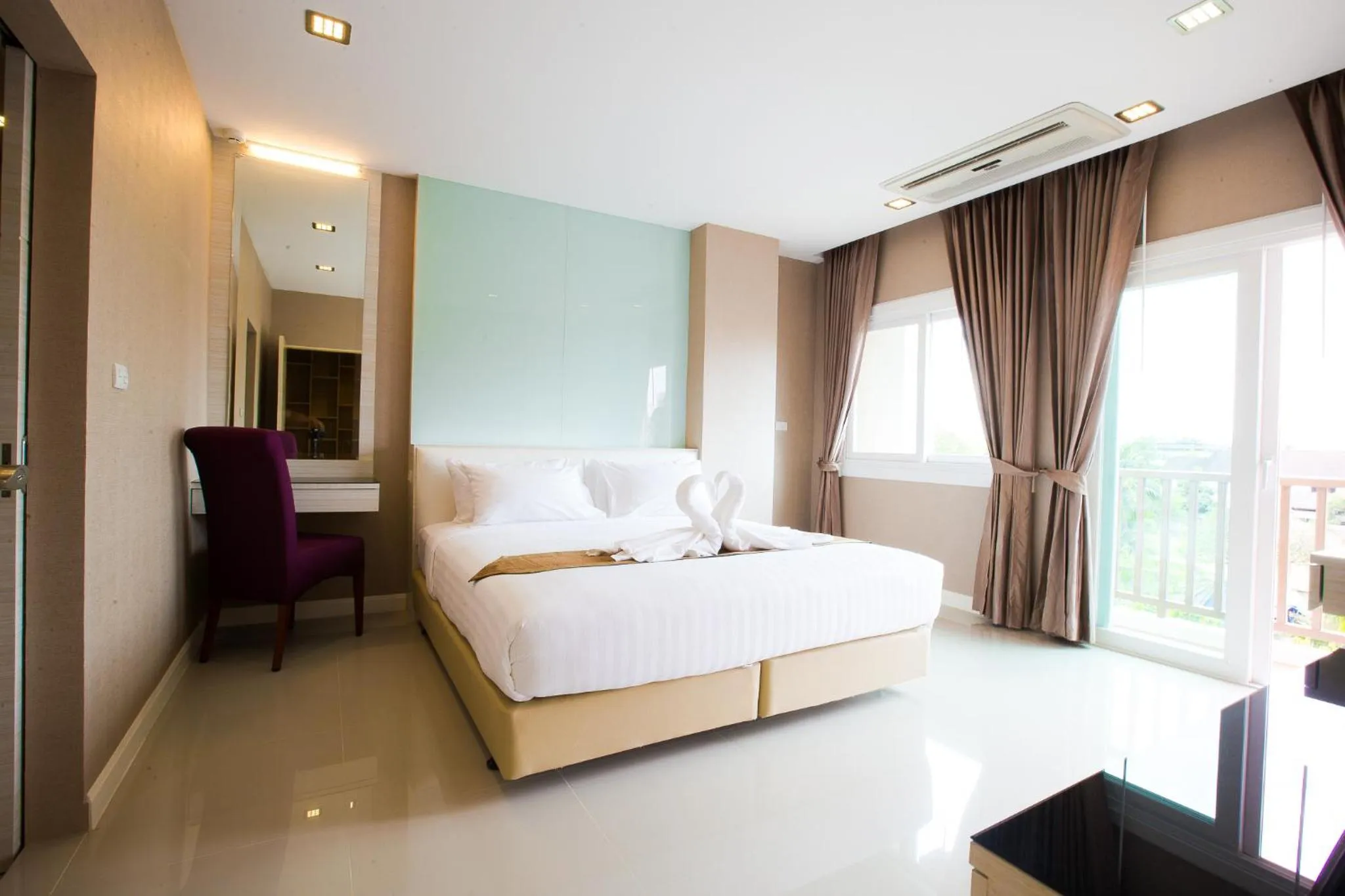 Bed in Romantic Khon Kaen Hotel