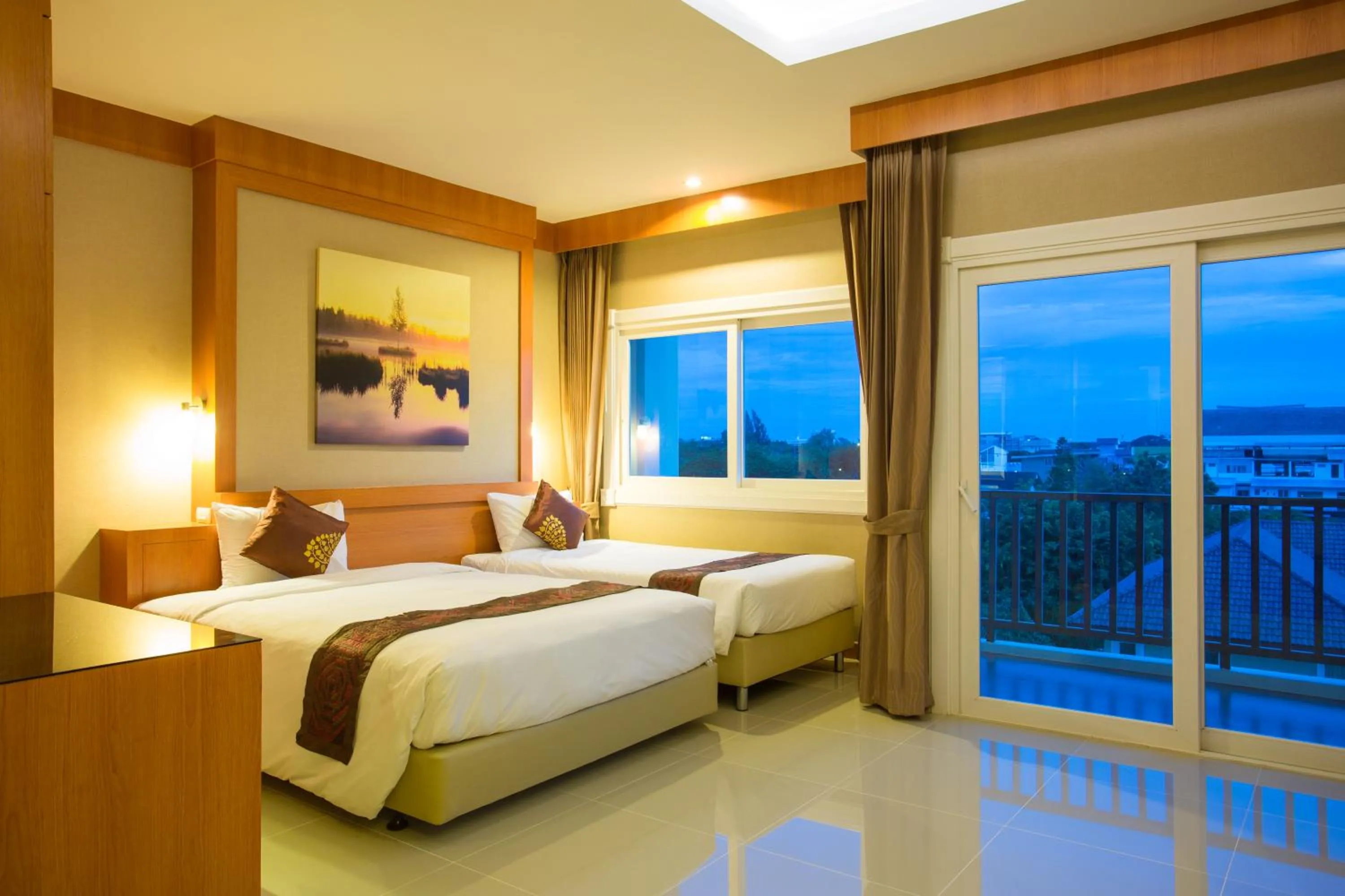 Bed in Romantic Khon Kaen Hotel