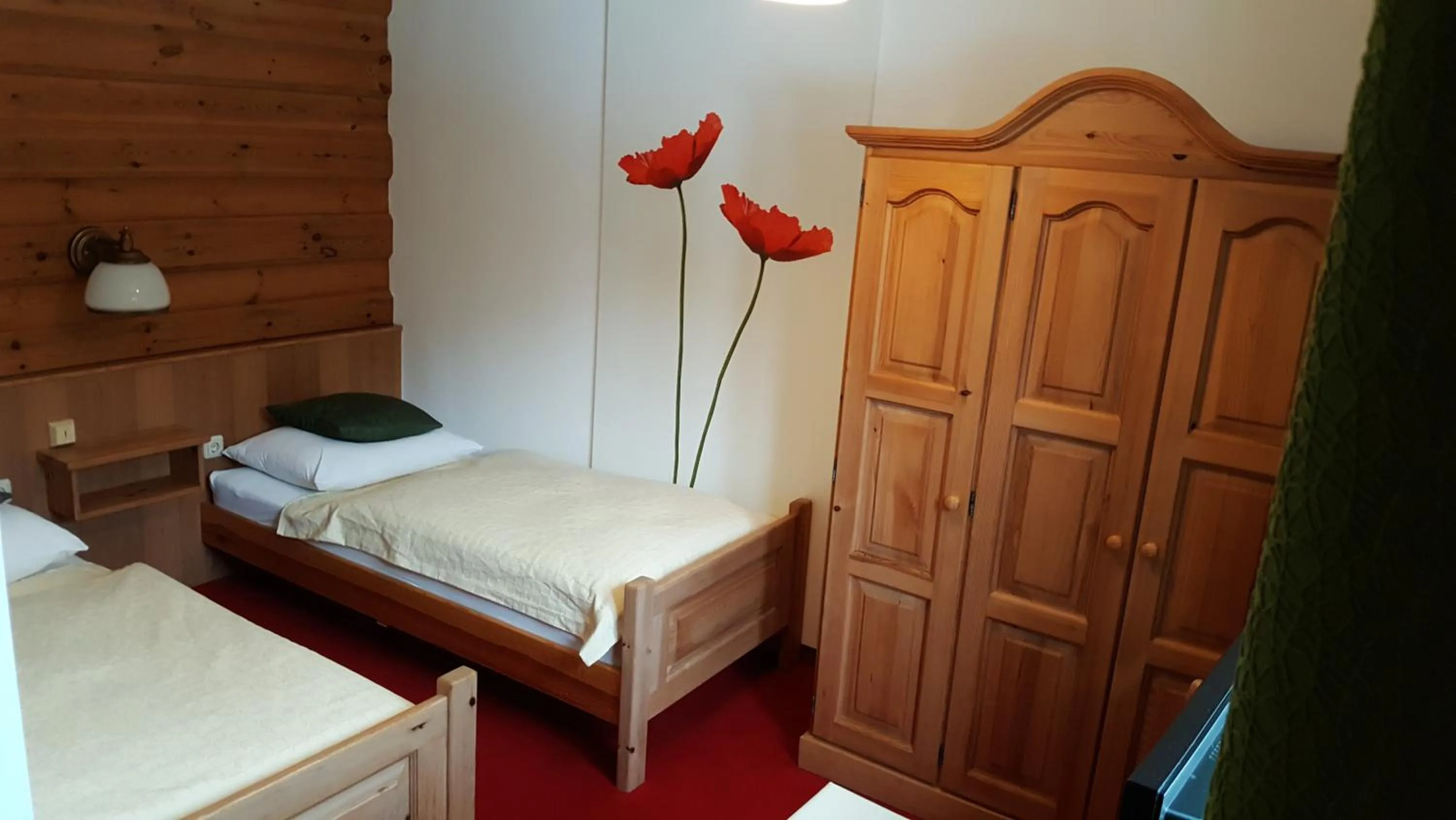 Bedroom in Landgasthof Steinmühl Hofbauer Frühstückspension und Campingplatz