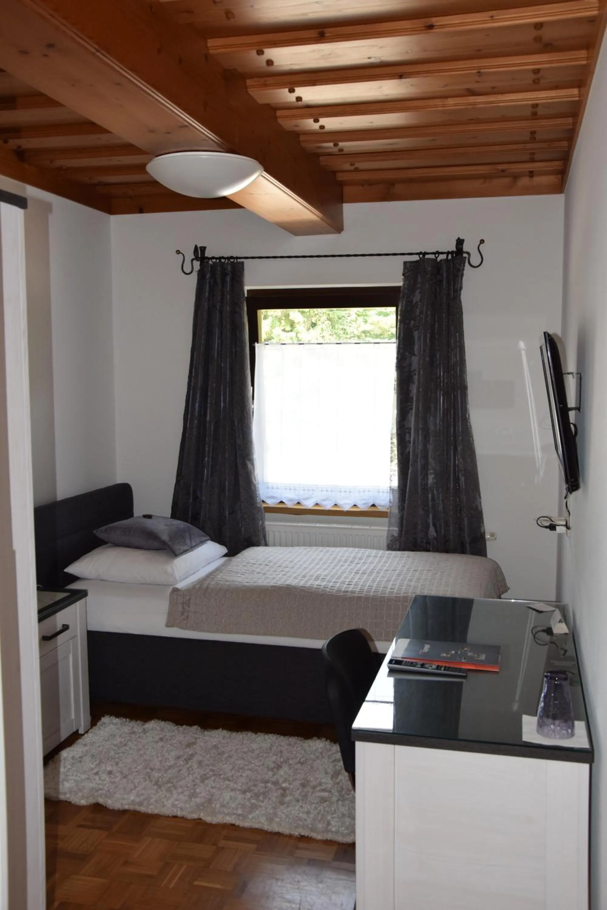 Bedroom in Landgasthof Steinmühl Hofbauer Frühstückspension und Campingplatz