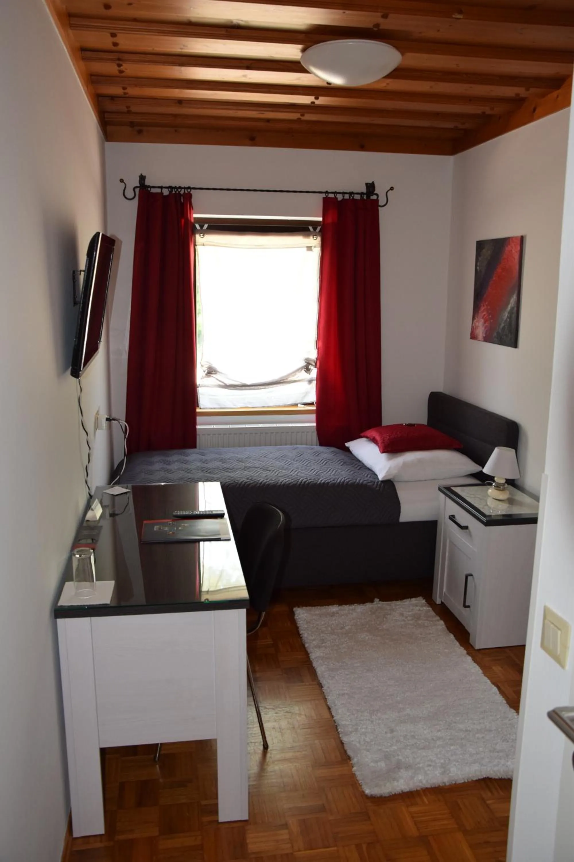 Bedroom in Landgasthof Steinmühl Hofbauer Frühstückspension und Campingplatz