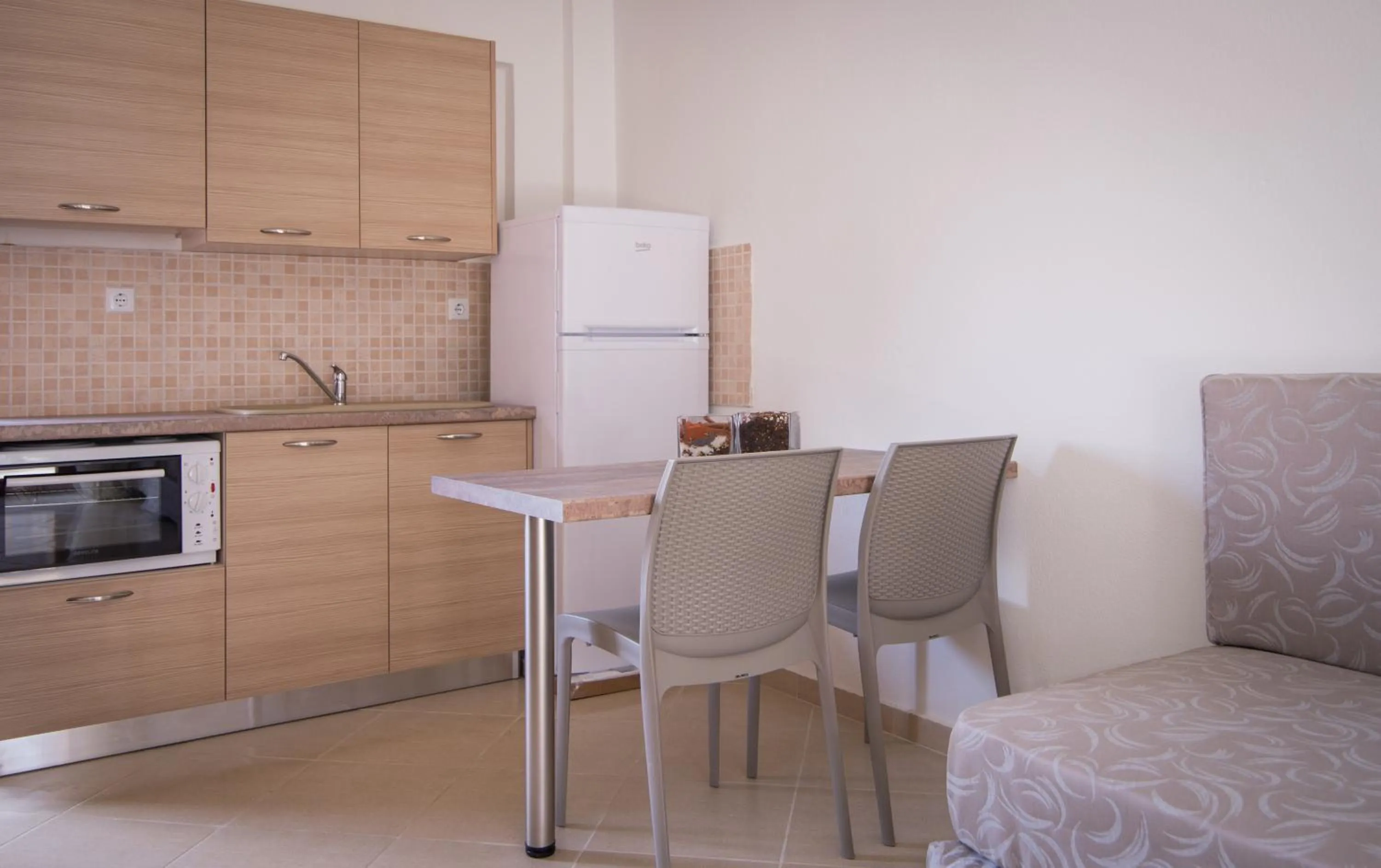 Kitchen or kitchenette in Apanemia by Flegra Hotels