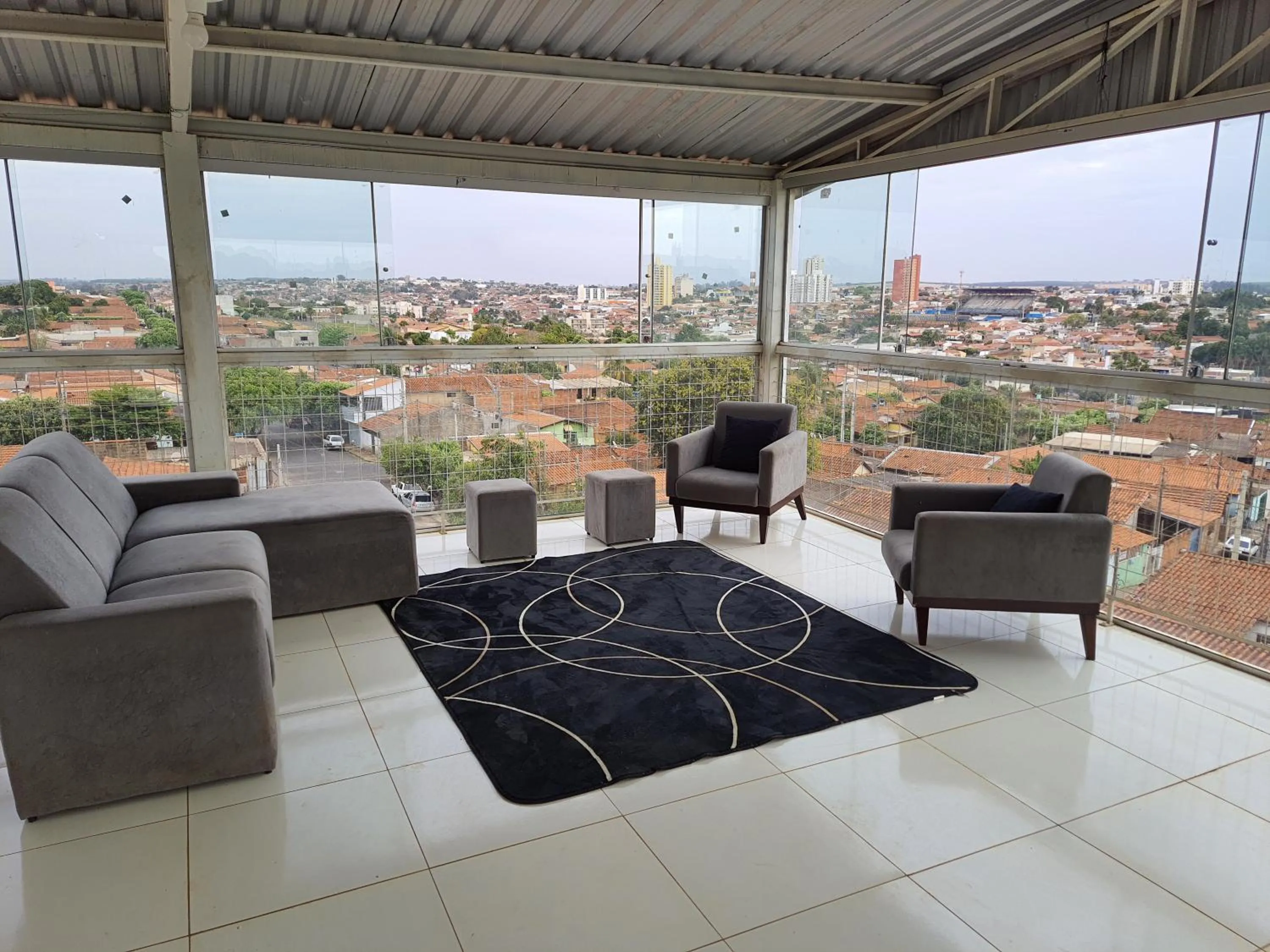 Seating area in Pousada Pimenta Olimpia