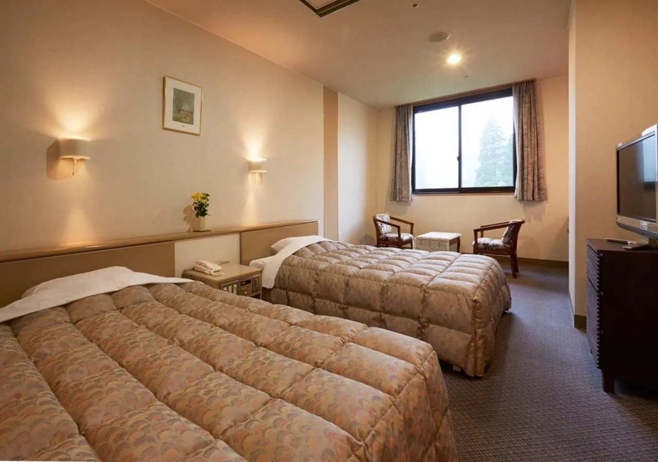 Bed in Kirishima Hotel