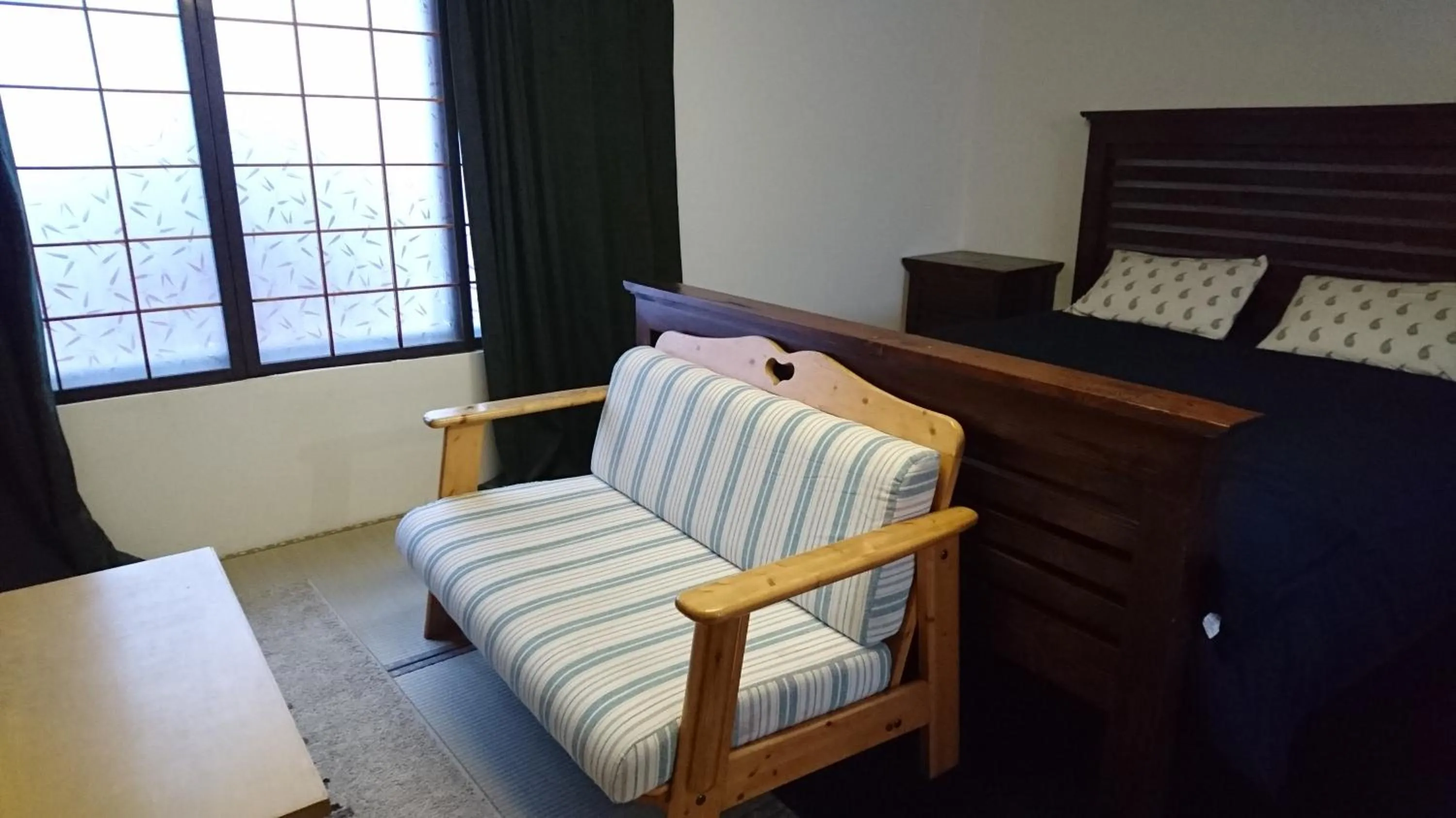 Bed in Yukiyama Chalet Apartments