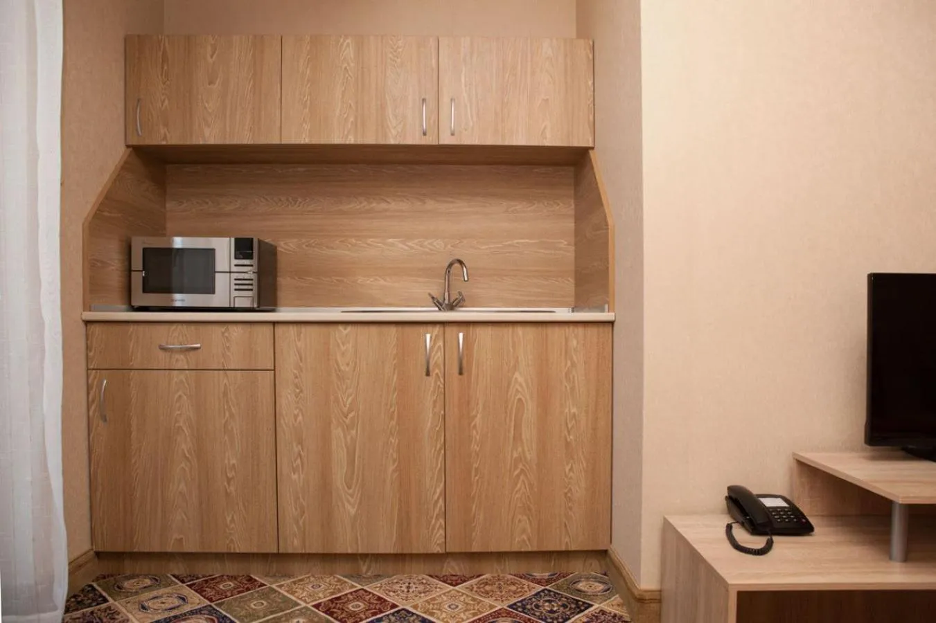 Kitchen or kitchenette in Hotel Motto