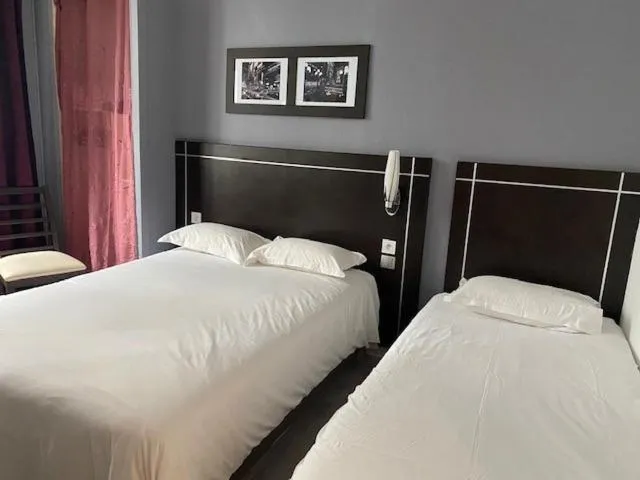 Bed in Hôtel Le Home Saint Louis