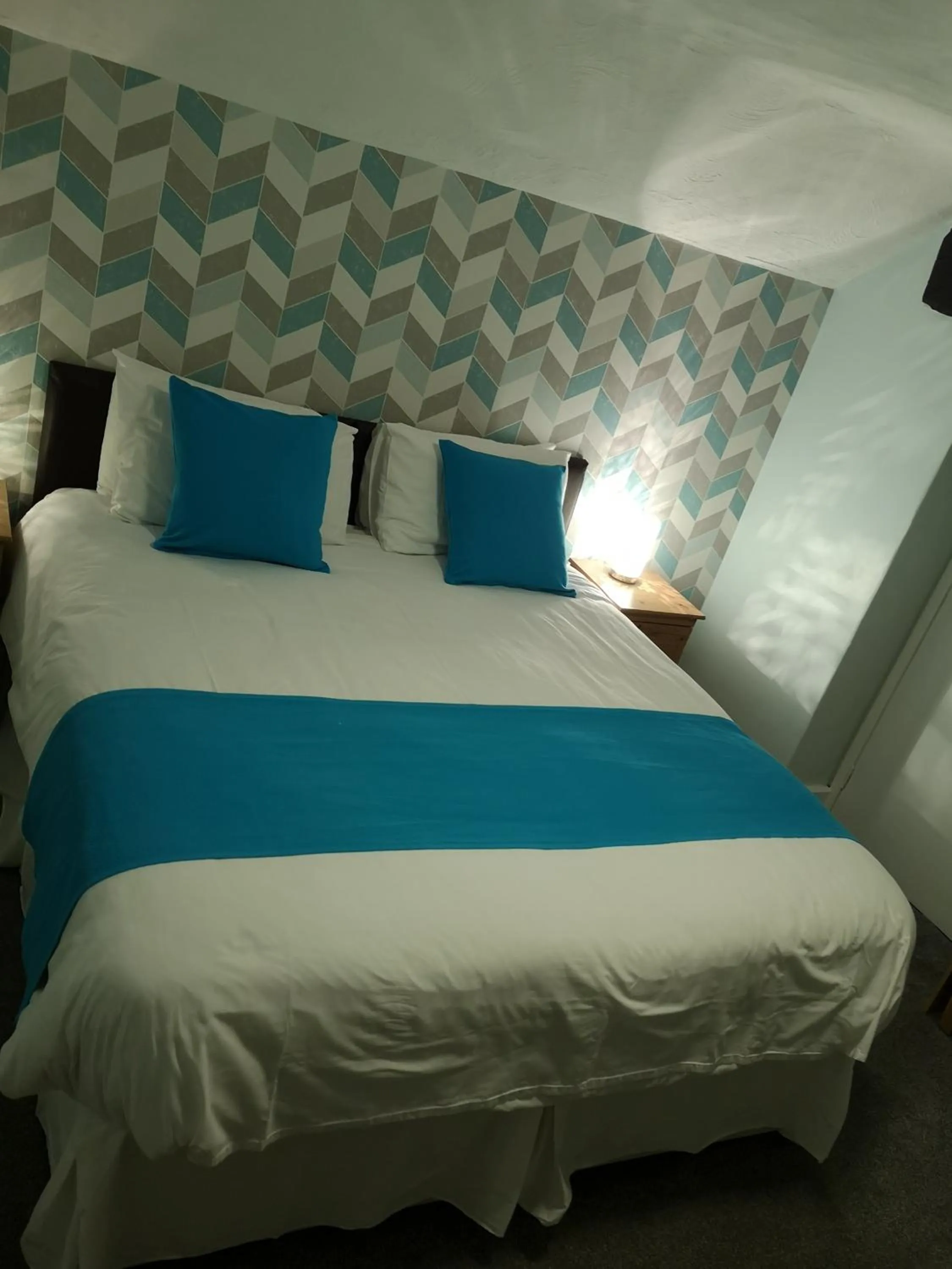 Decorative detail, Bed in Y Giler Arms