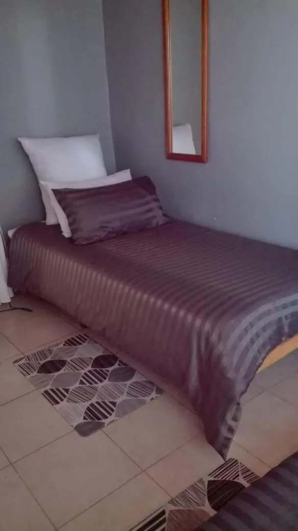 Bed in Beulahland Guesthouse