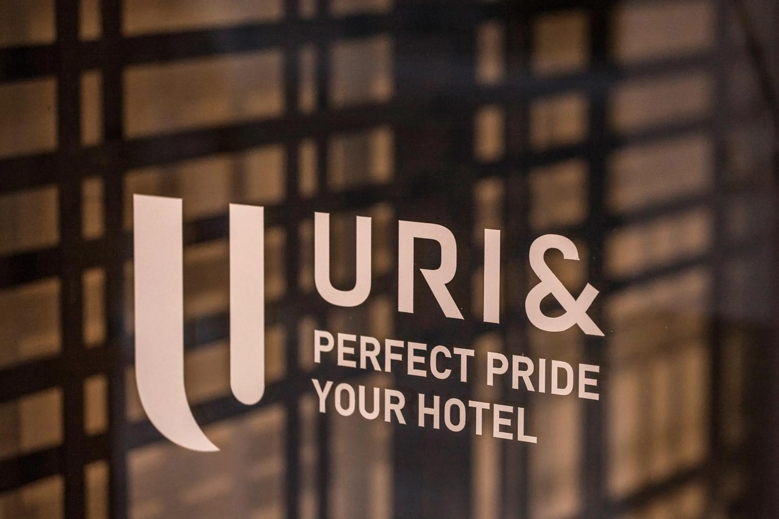 Property logo or sign in Hotel Uri&