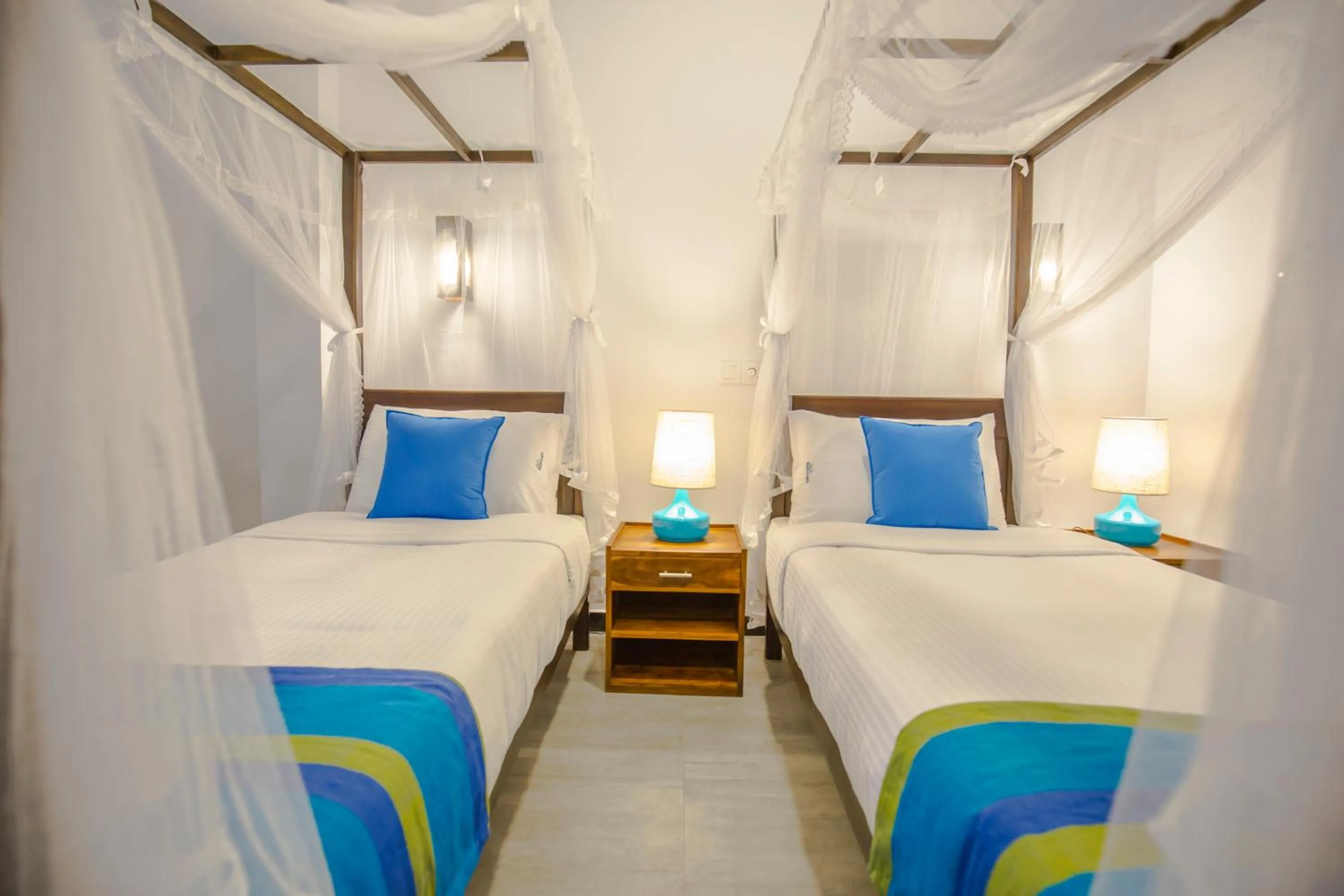 Bed in Wavelength Hotel & Wellness Center