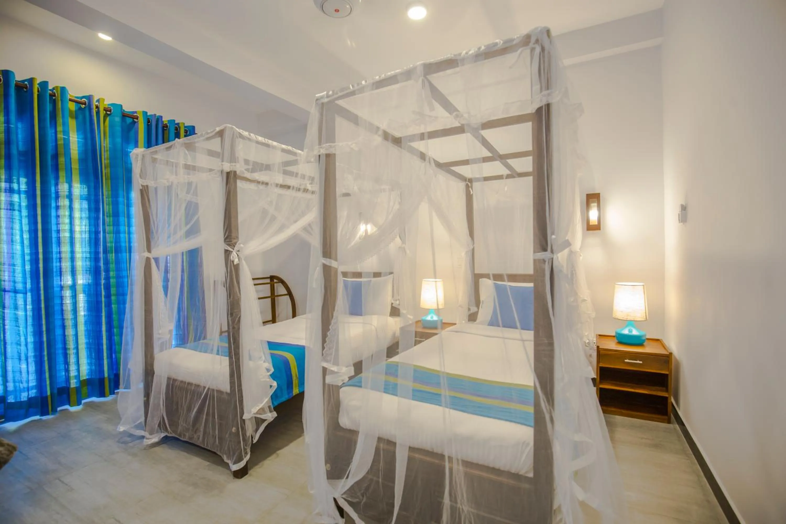 Bed in Wavelength Hotel & Wellness Center