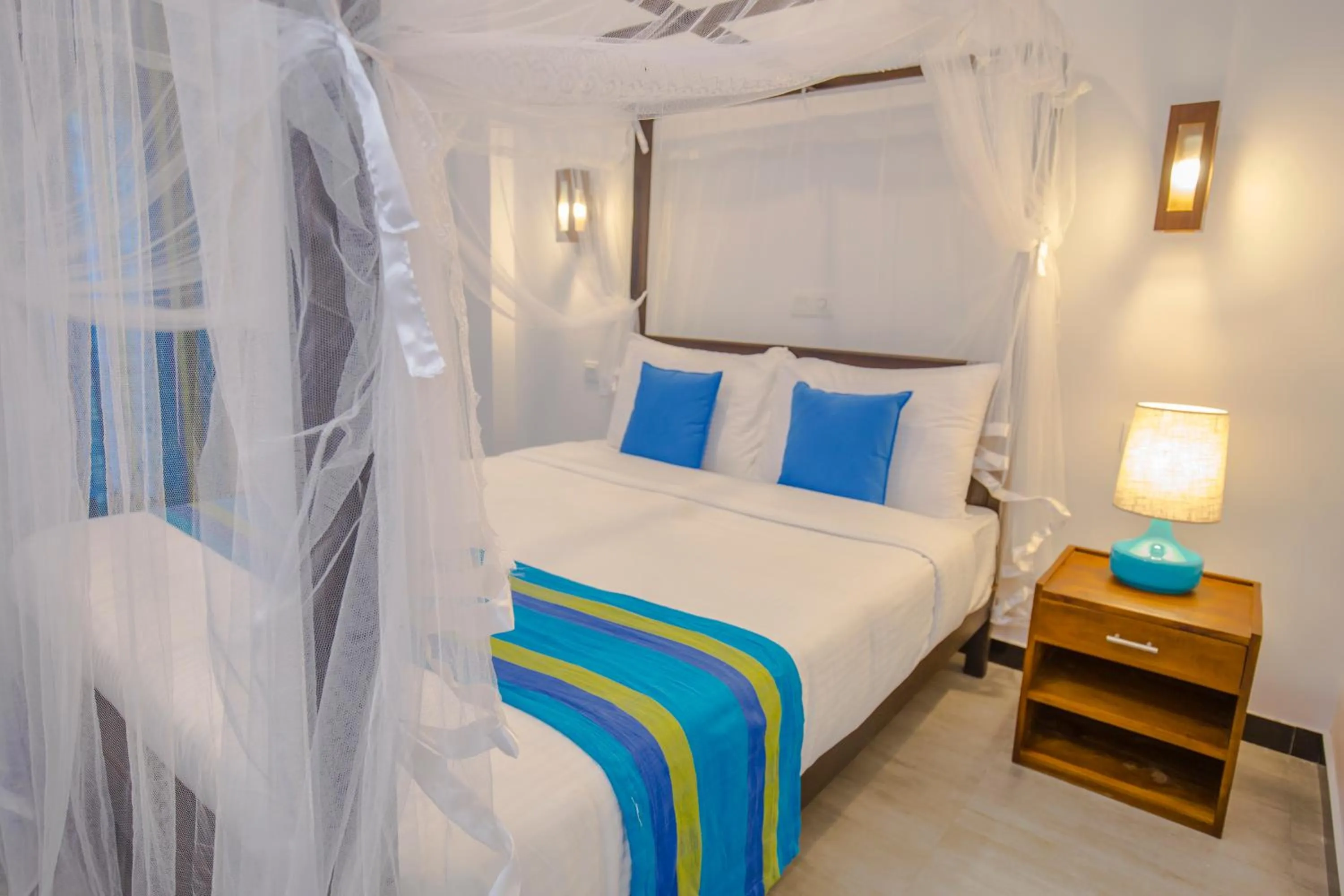 Bed in Wavelength Hotel & Wellness Center