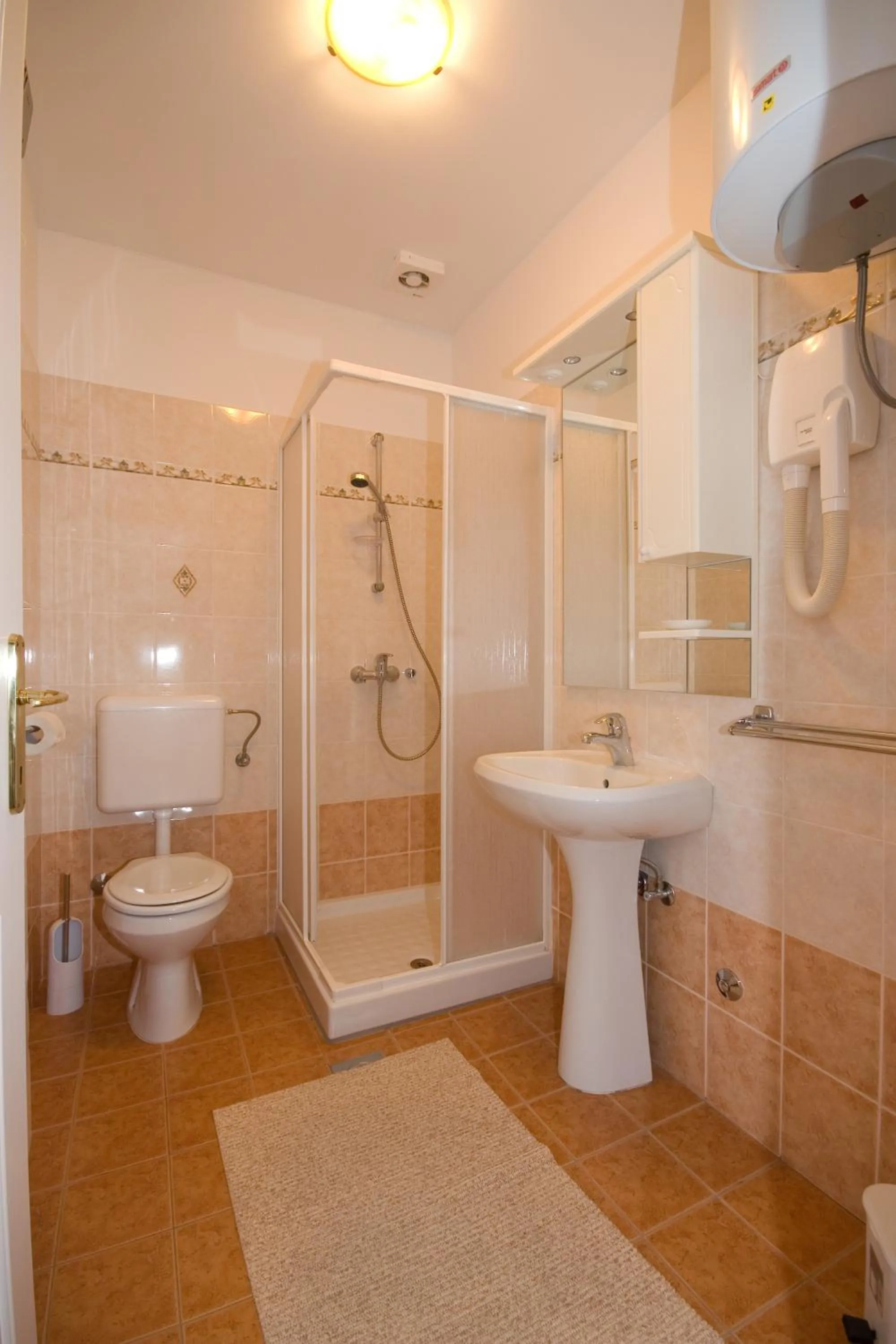 Bathroom in Apartments Valentino