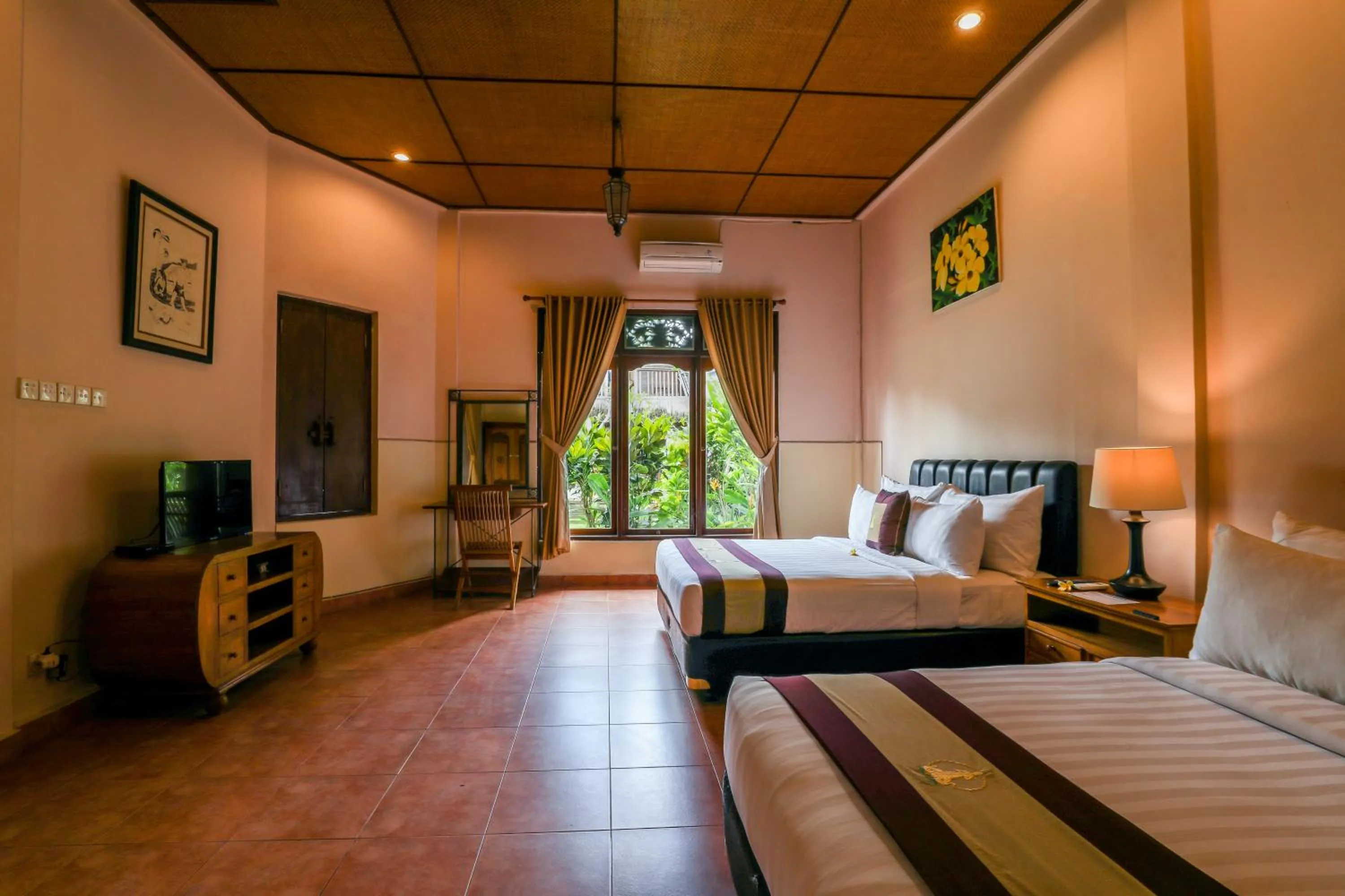 Bed in Uma Dawa Resort and Spa