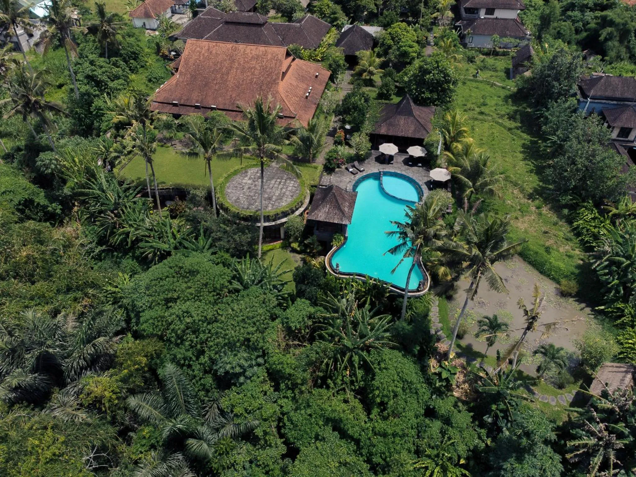 Swimming pool in Uma Dawa Resort and Spa