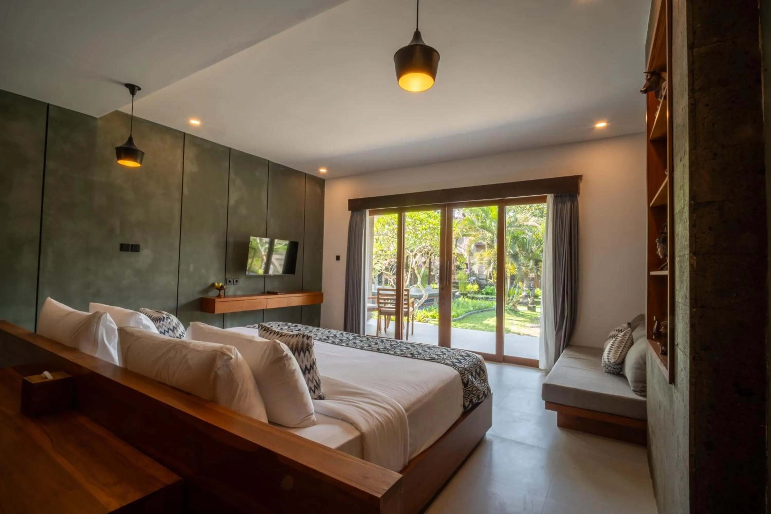 Bed in Uma Dawa Resort and Spa