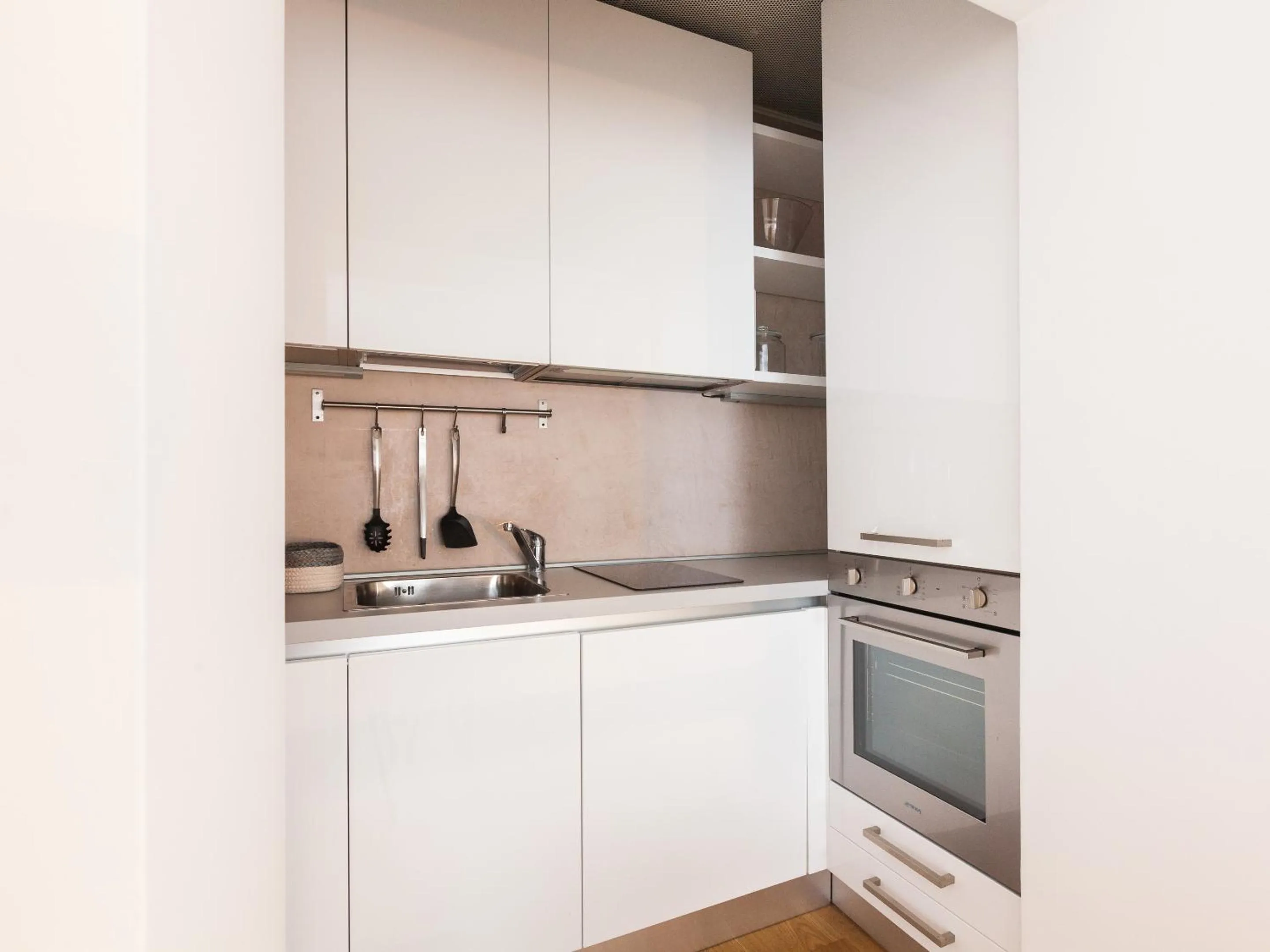 Kitchen or kitchenette in easyhomes - Spiga Suite