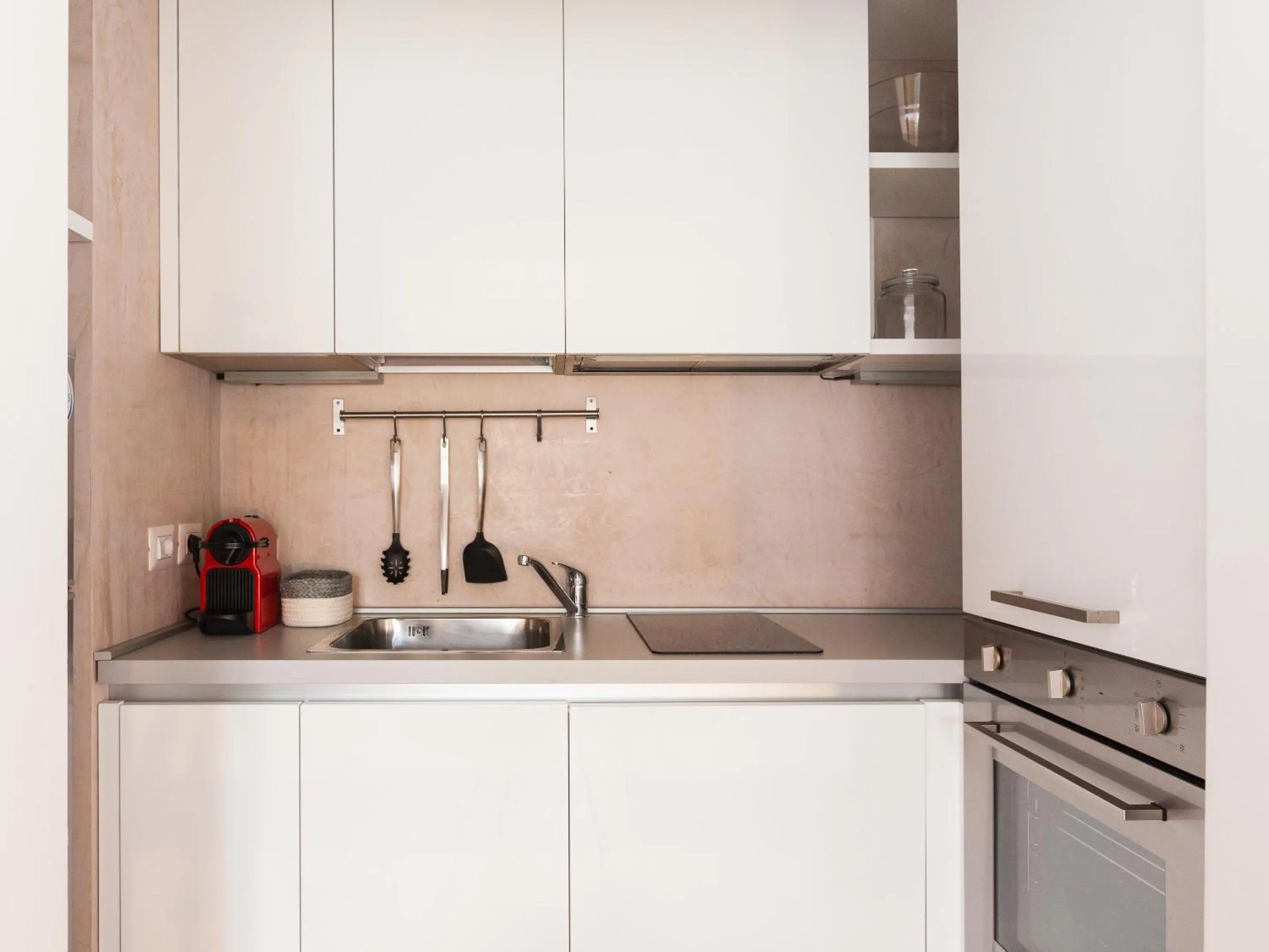 Kitchen or kitchenette in easyhomes - Spiga Suite