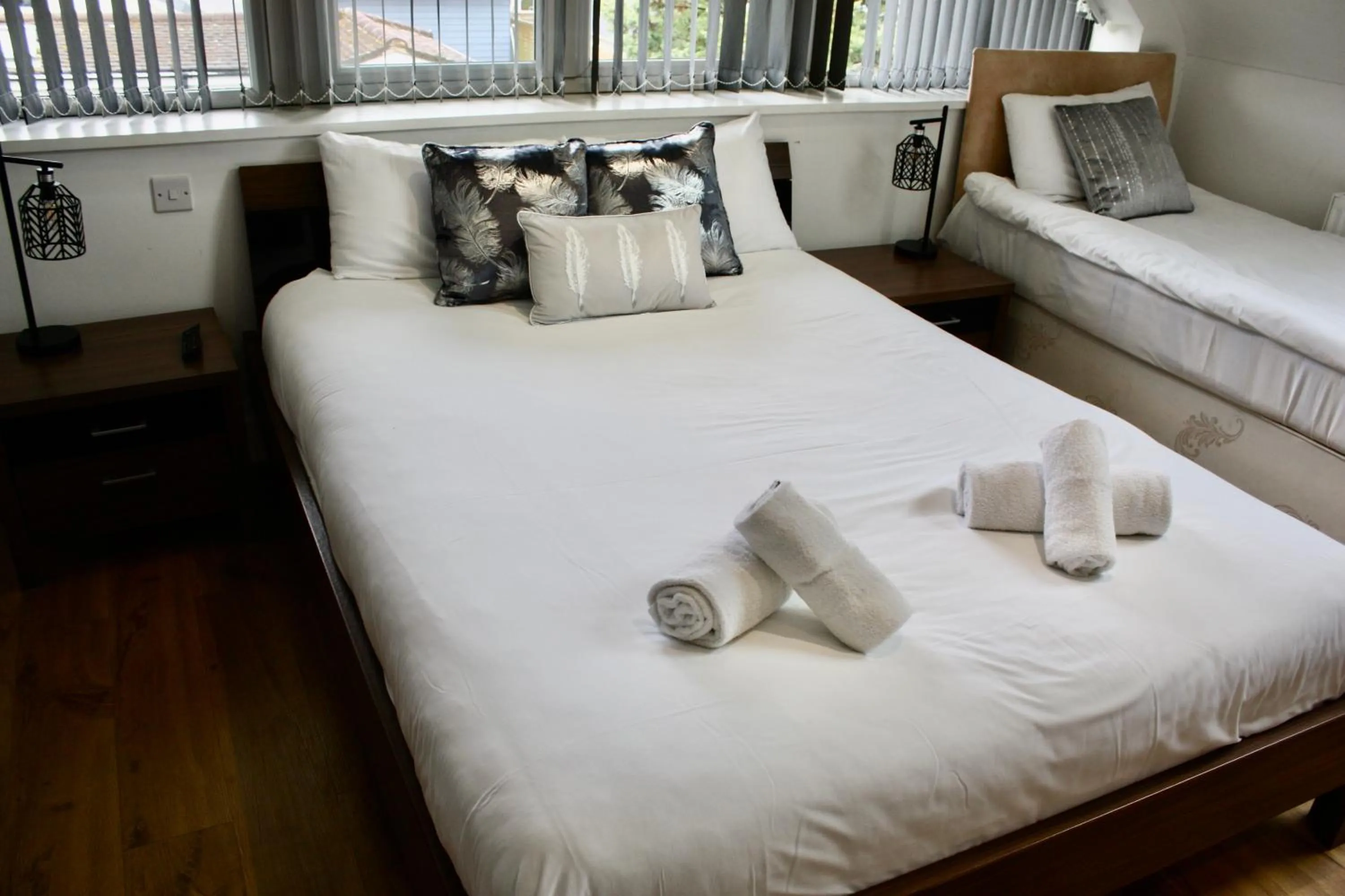 Bed in Four Corners Holiday Home Hot Tub & Sauna