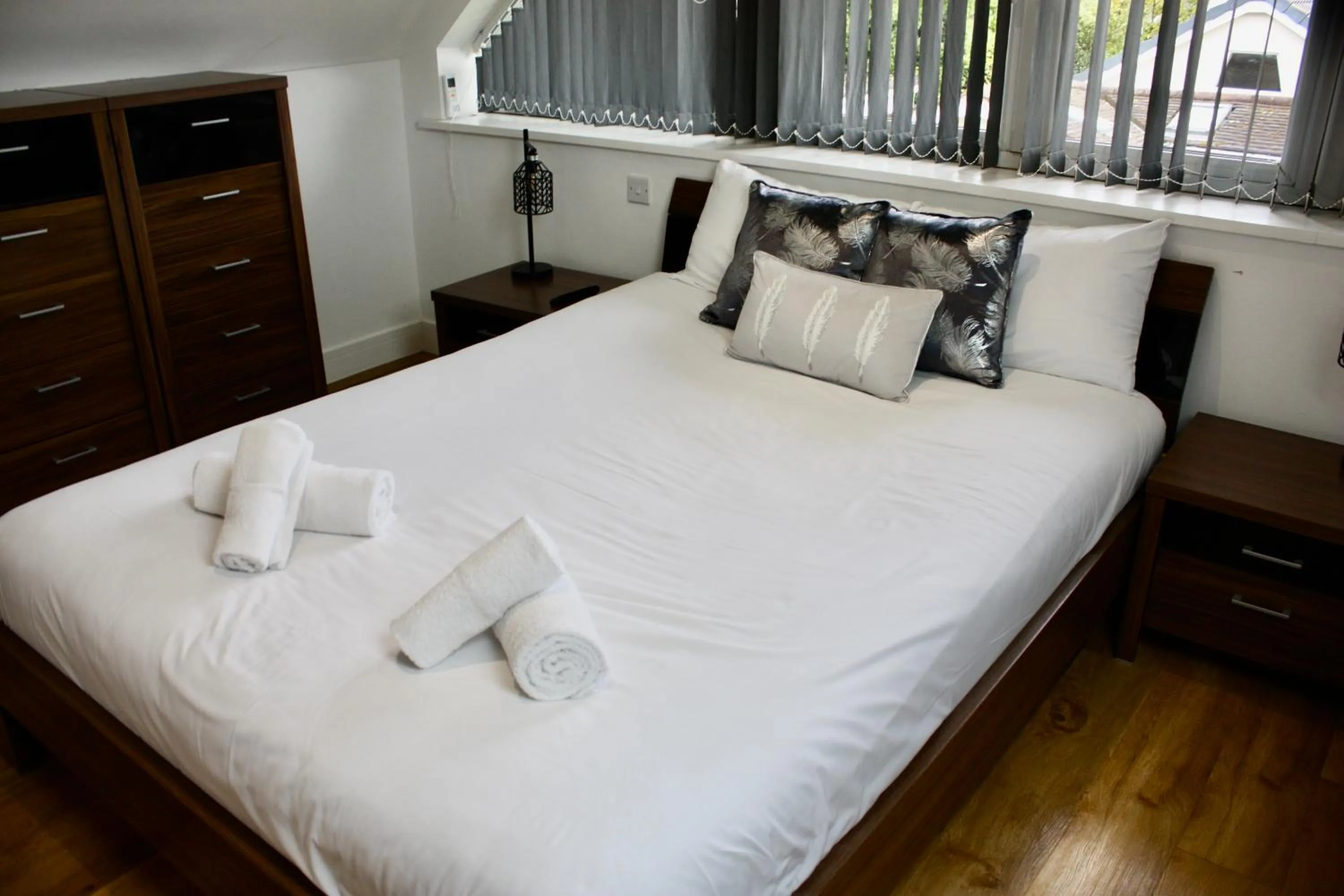 Bed in Four Corners Holiday Home Hot Tub & Sauna