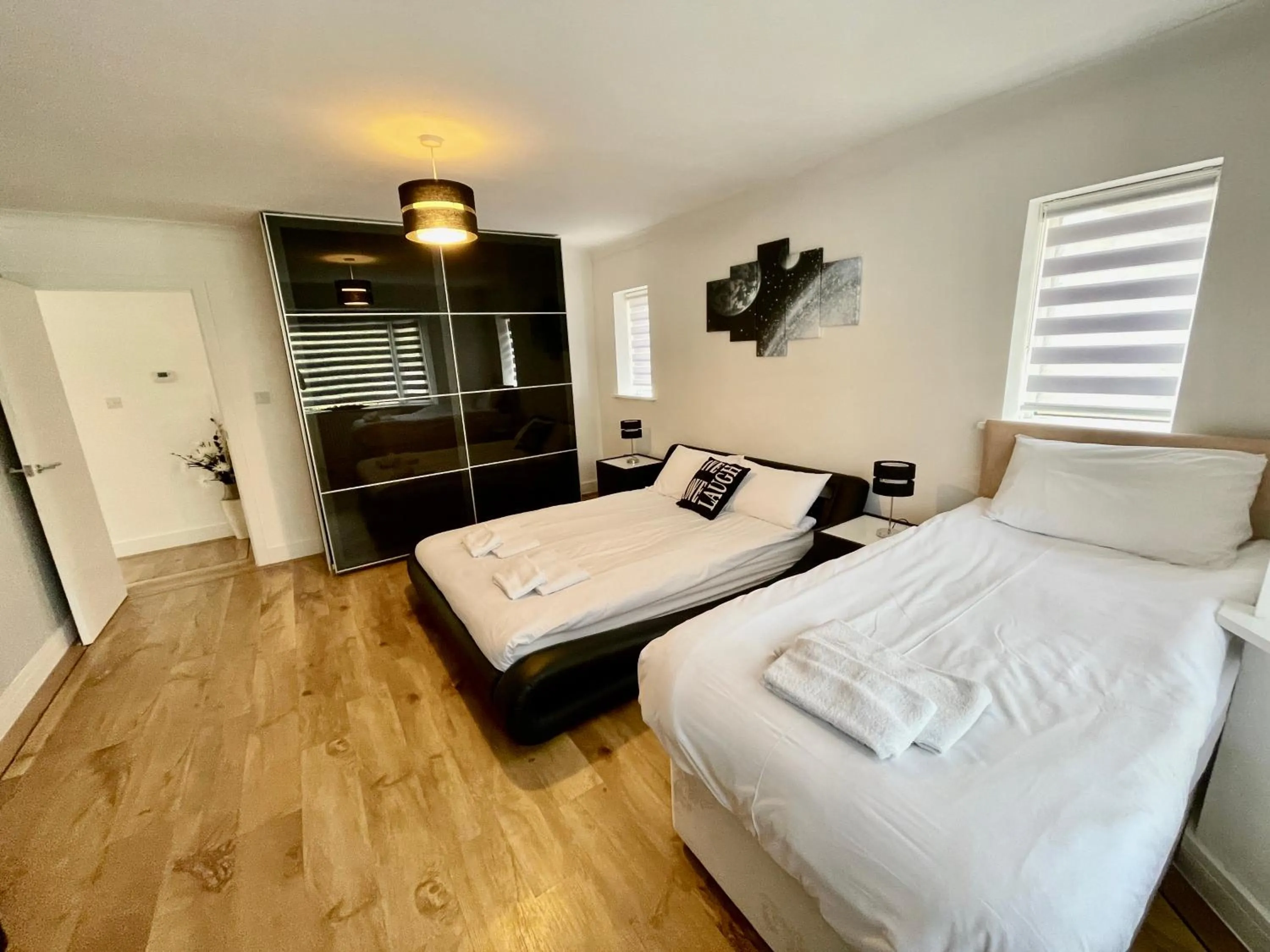 Bed in Four Corners Holiday Home Hot Tub & Sauna