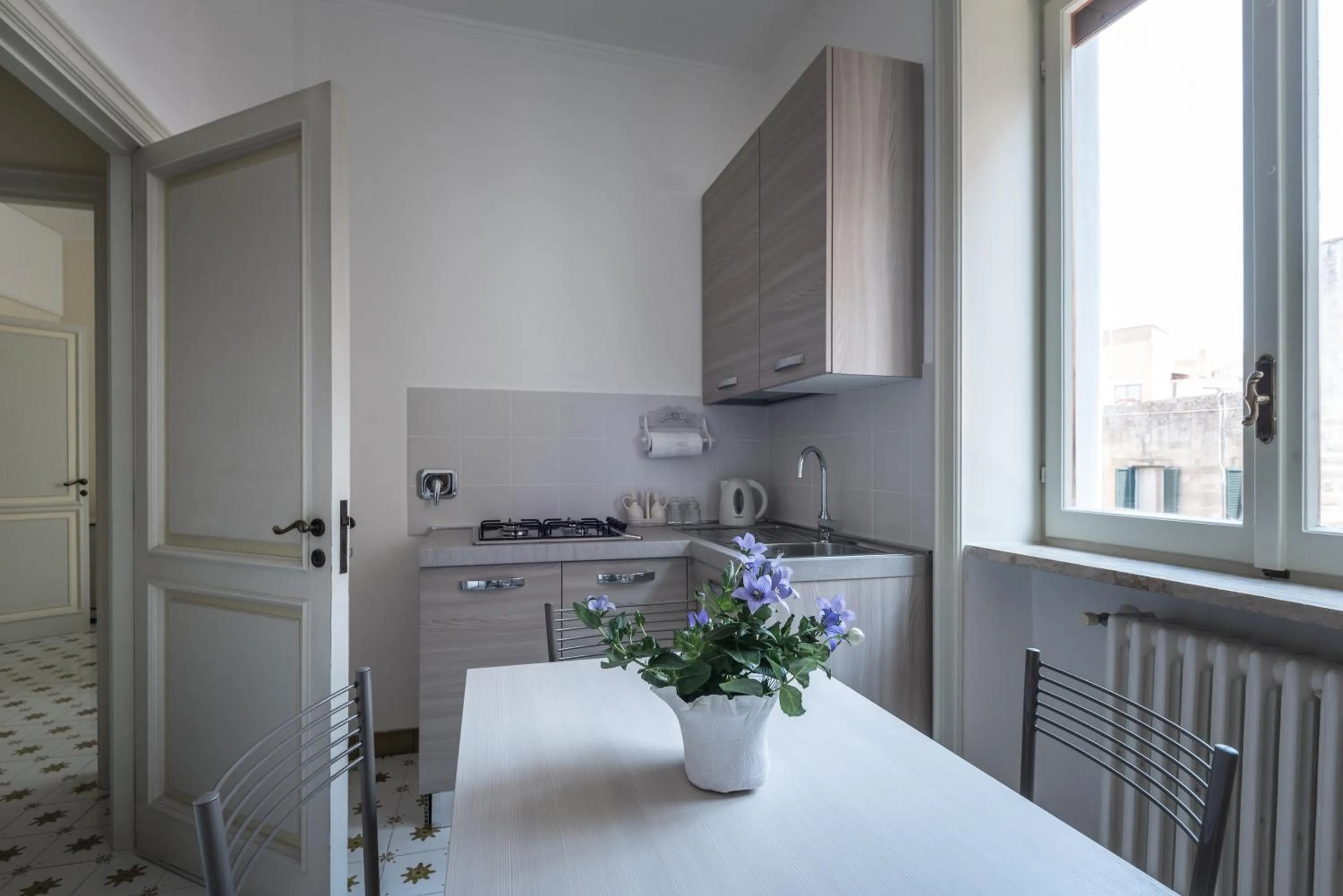 Kitchen or kitchenette in Suite della villa