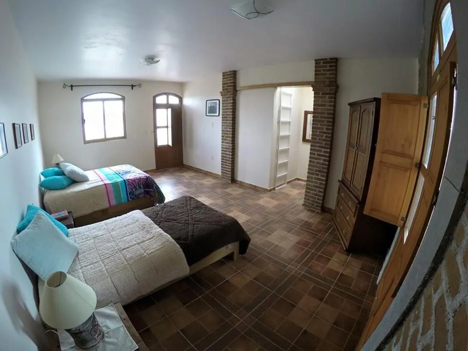 Photo of the whole room, Bed in Hostal el Dulce Nombre