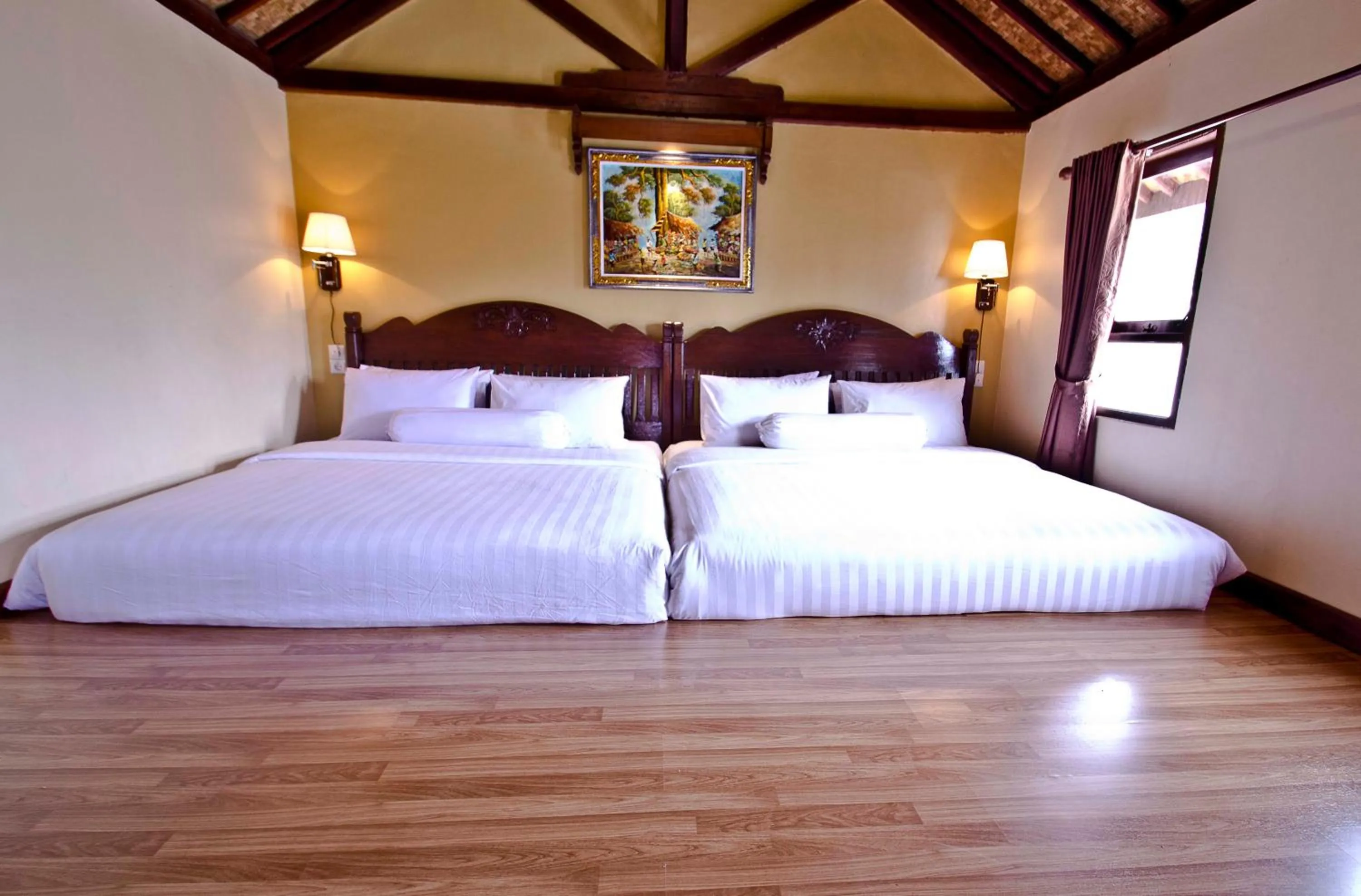 Bed in Puri Sakanti Nature Family Resort