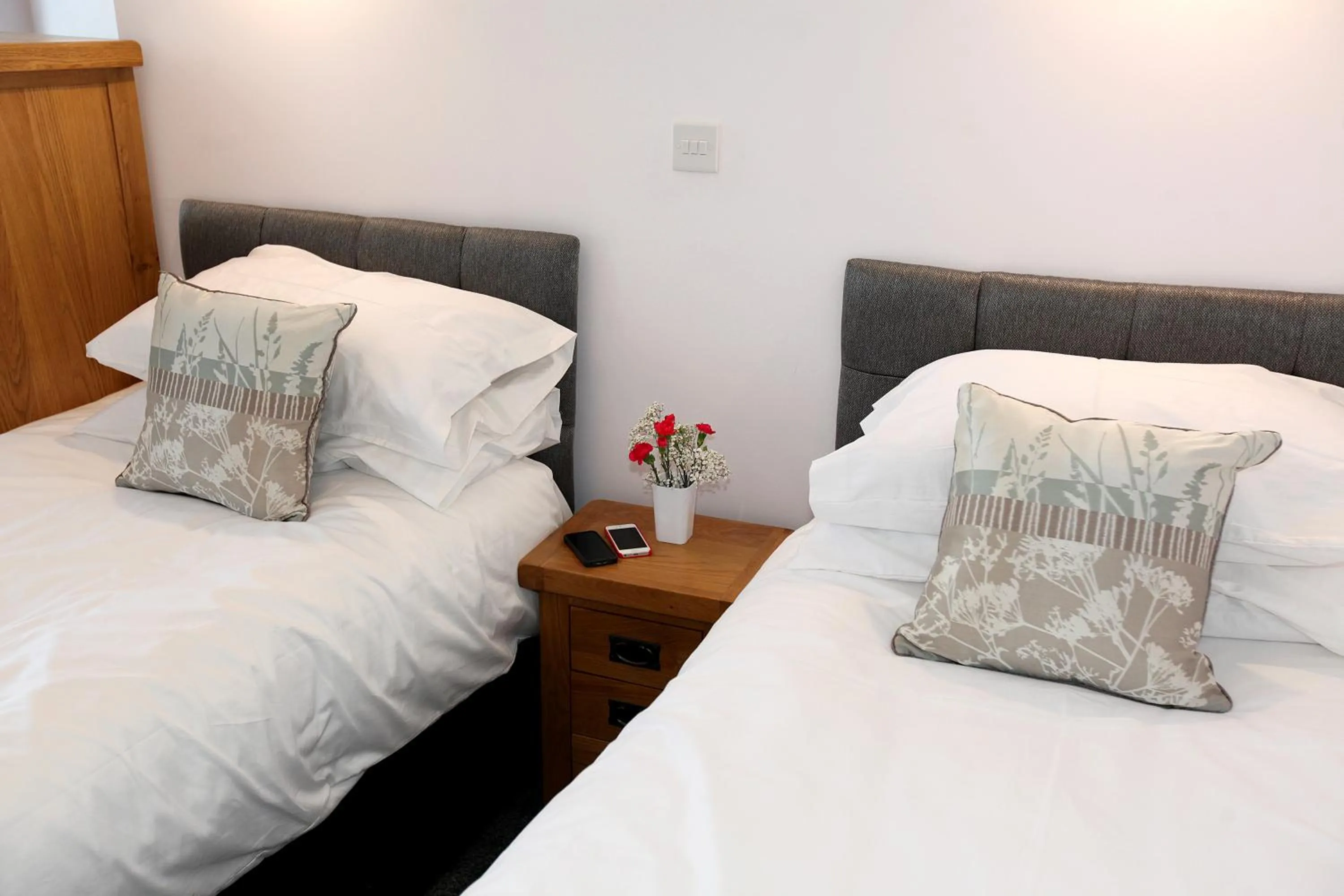 Bed in Austens Apartments