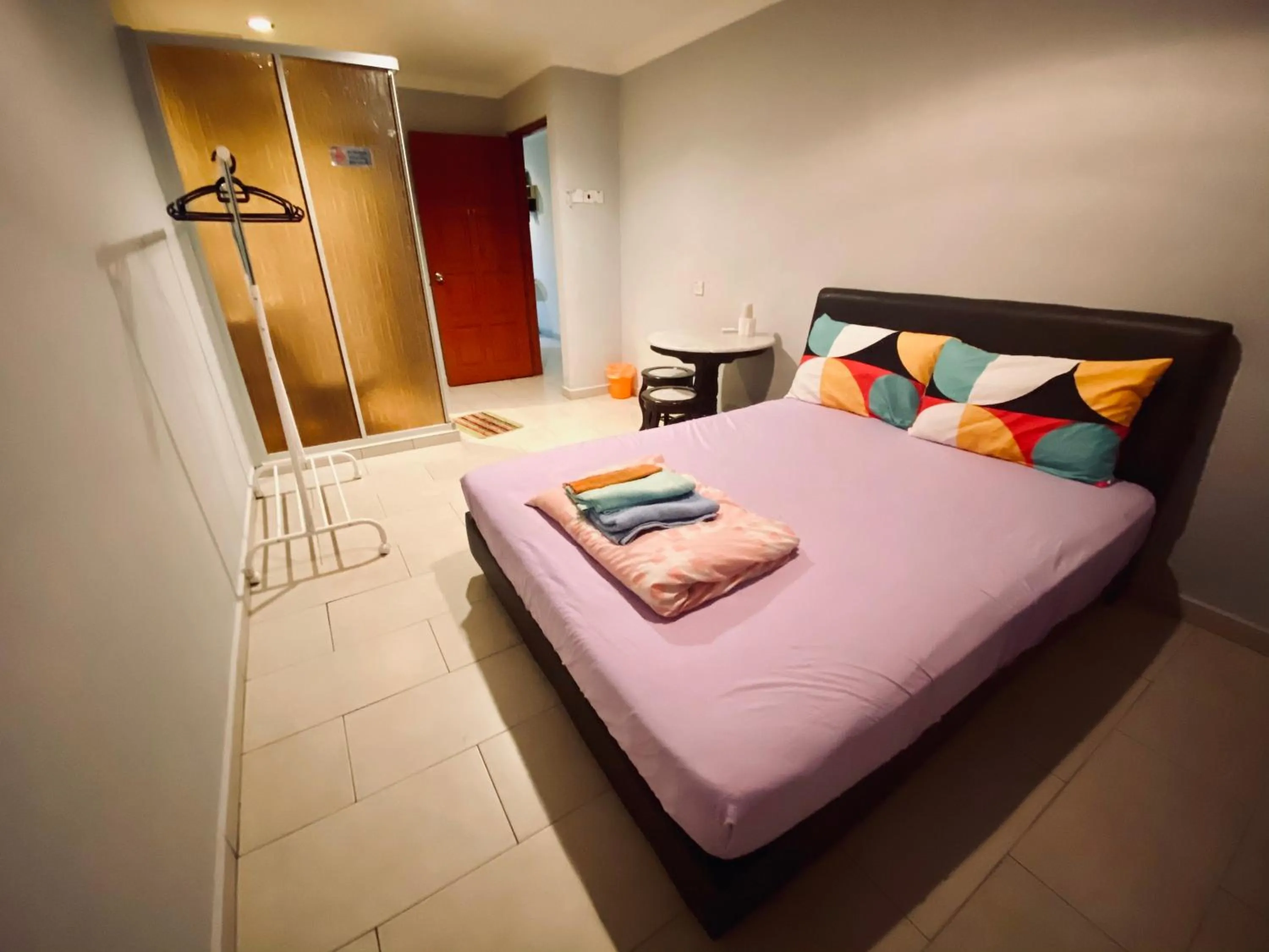 Photo of the whole room, Bed in YY Residences