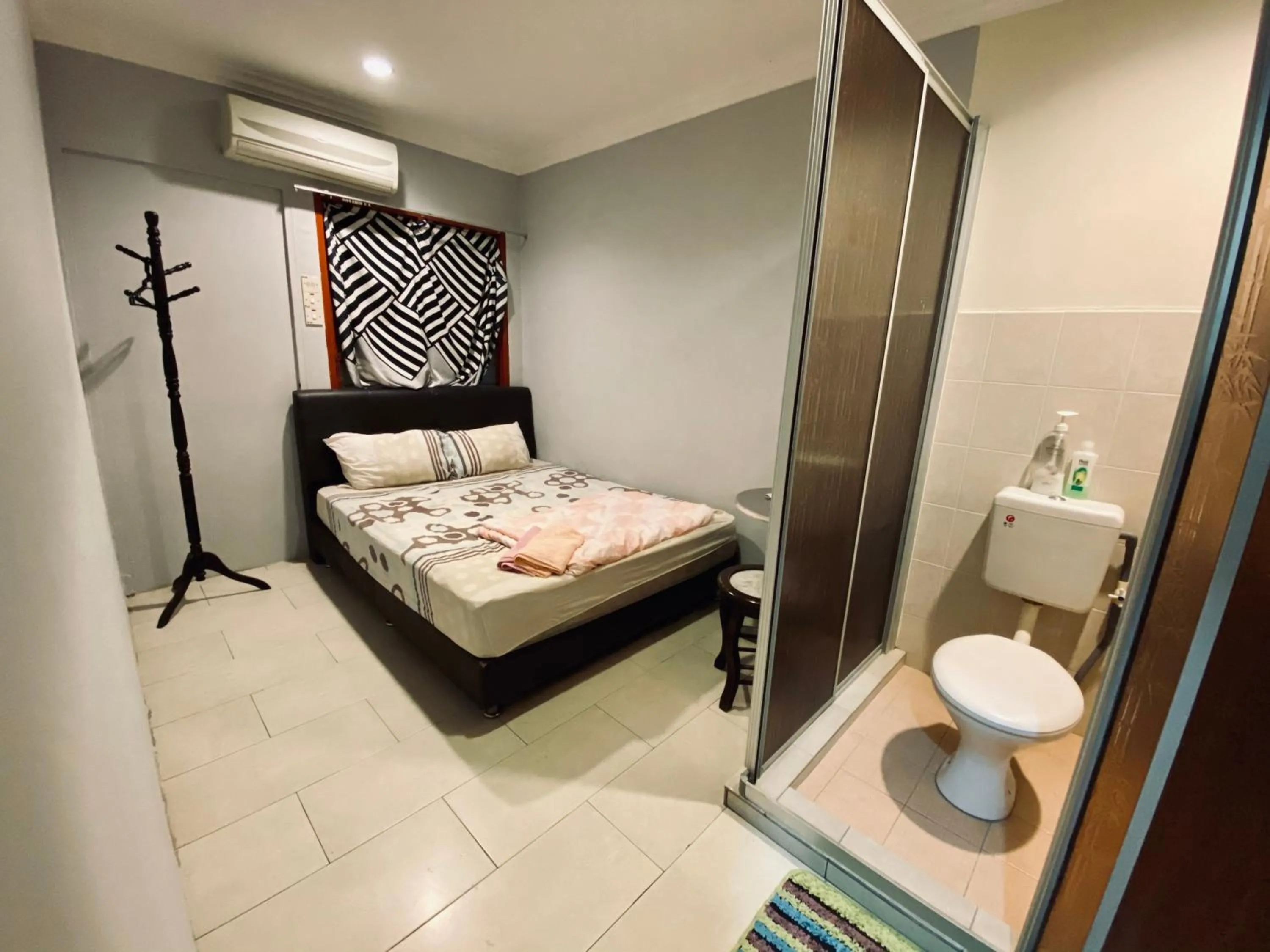 Photo of the whole room, Bed in YY Residences